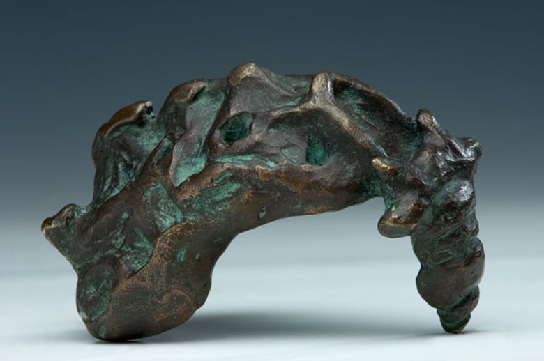 Sacrum, bronze 13 × 24 x 12 cm