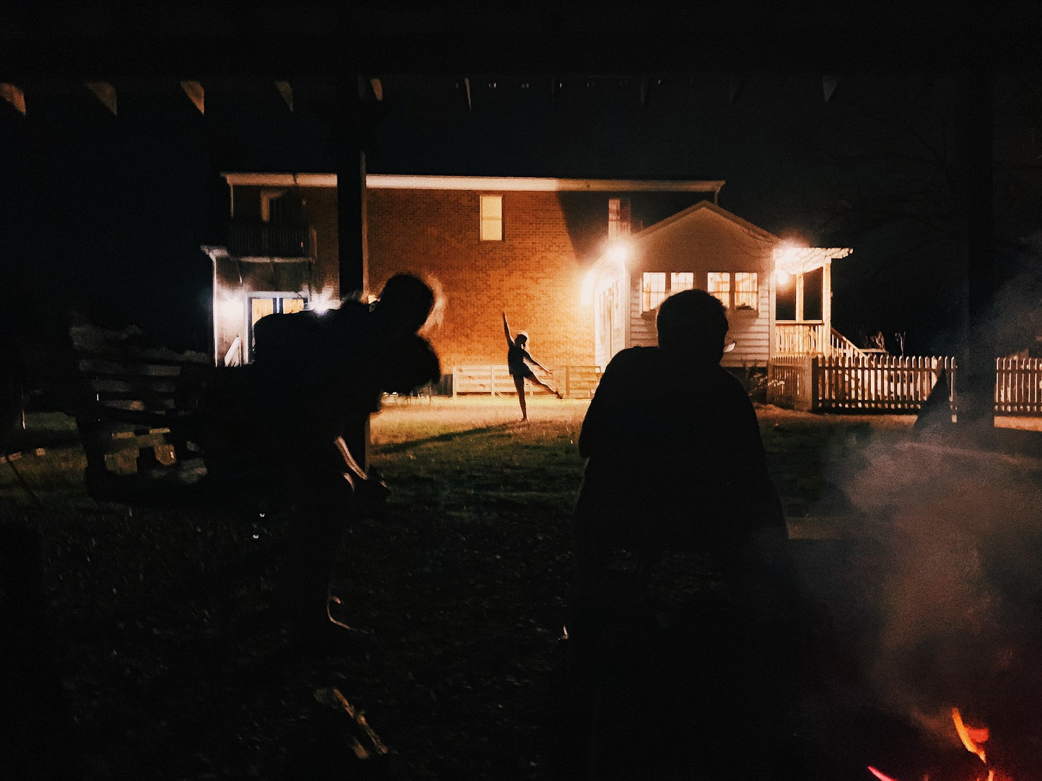 Sister dancing wiht the light. Photograph from Dean Hinnant’s Blood series exploring siblinghood and family bonds