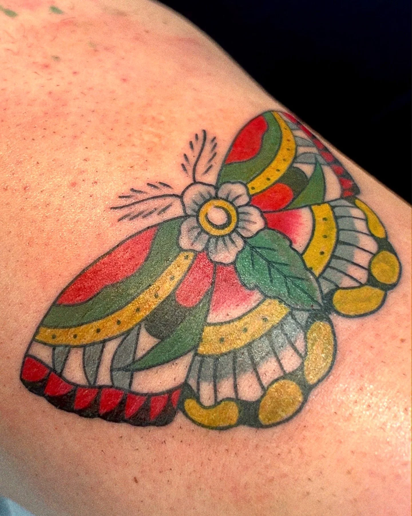 Butterfly tattoo from the flashbook! With a different color way 😊🙌🏽
