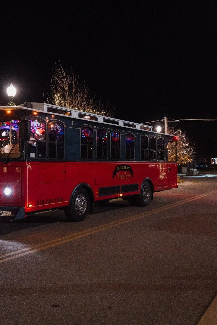 Bixby First Assembly trolley on street.jpg