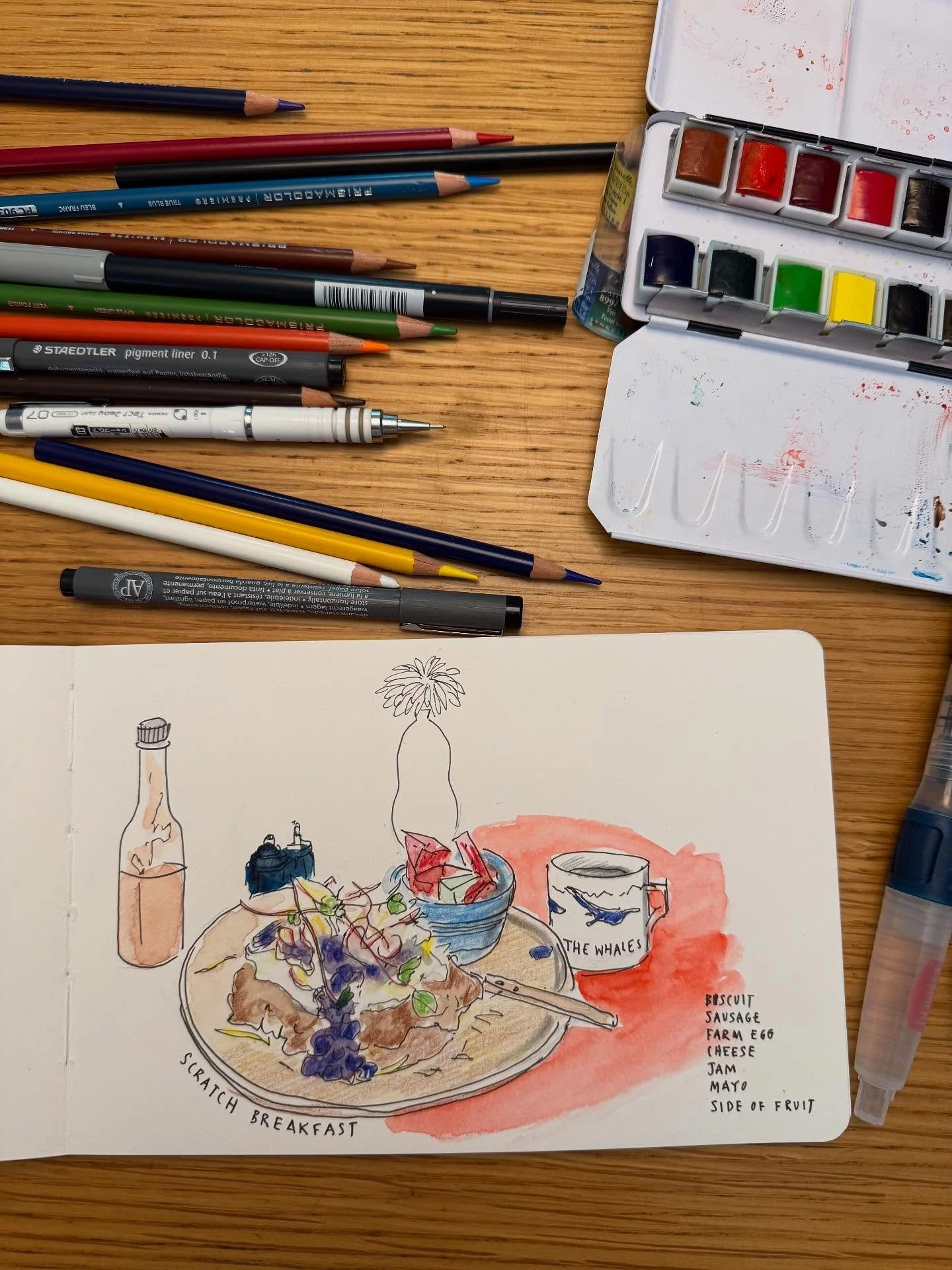 Breakfast and a quick sketch at @scratch_midcity_lafayette this morning. 
#sennelierwatercolors #prismacolors #foodillustration #illustration #breakfast