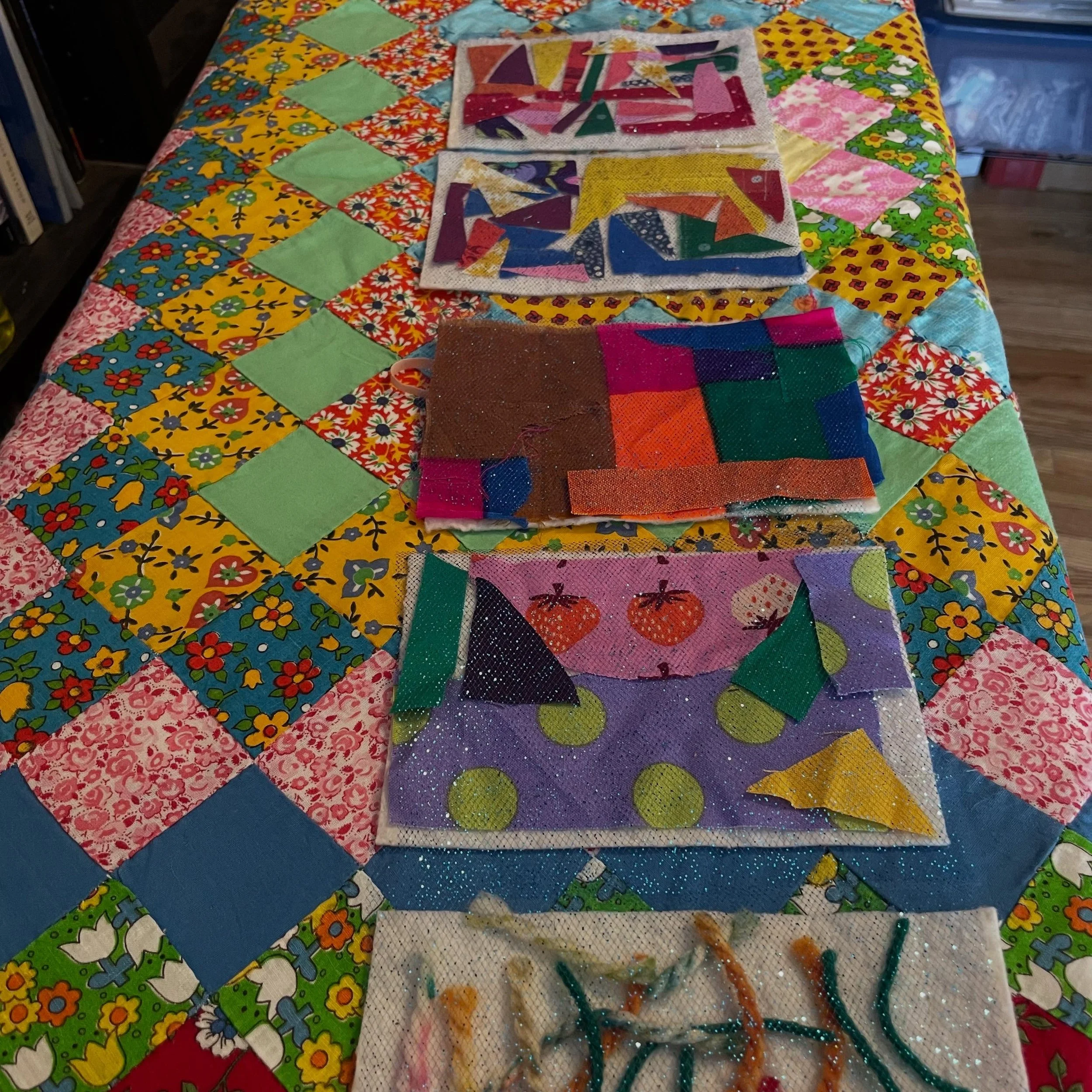 Cooking up some scrappy postcards and finally doing some quilting on that rummage sale top from a couple years ago. 🌈