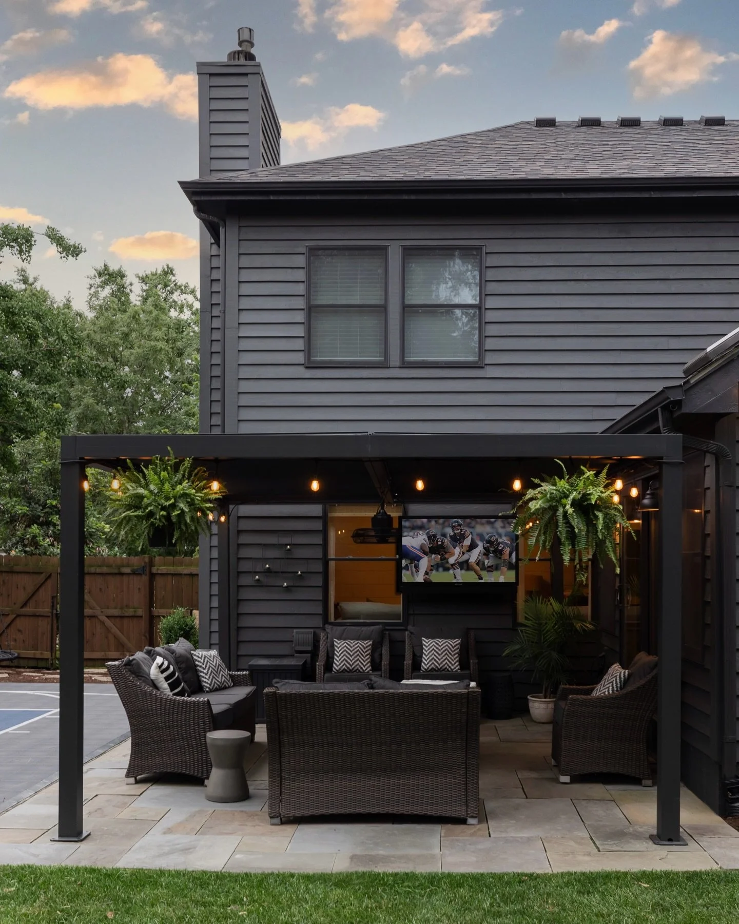 Dreaming of warmer days ❄️ 

Project: &ldquo;Shifting Gears&rdquo;
Photos by @yandbinteriorsphotography 

#edcShiftingGears #blackexterior #pergola #backyarddesign #bluestonepatio