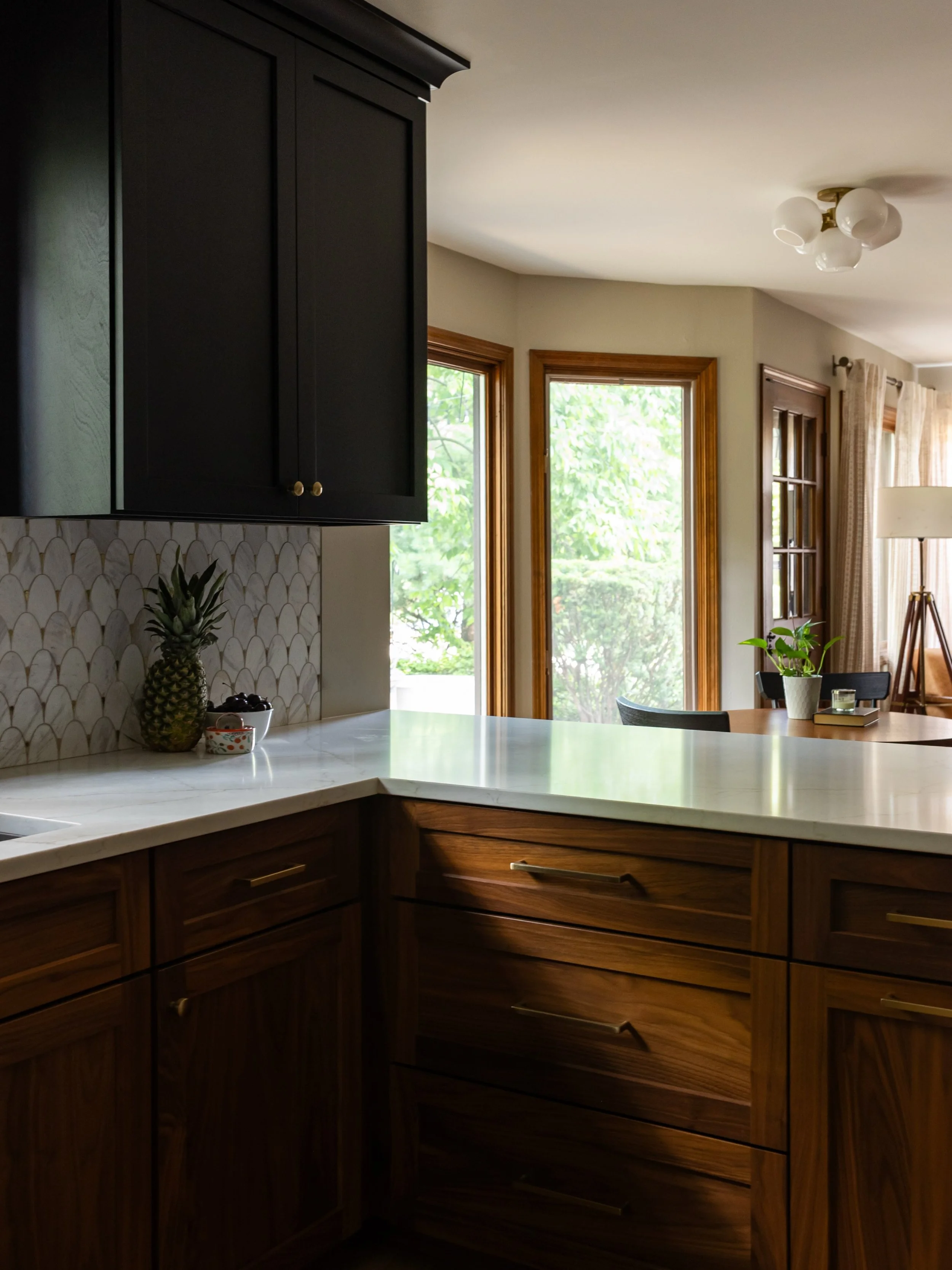 Fall is here. Our &ldquo;Black and Tan&rdquo; kitchen project is full of autumnal awesomeness. Black-stained oak contrasted by rich natural walnut, statement tile, and warm brass accents make this space a one-of-a-kind gem. 

Photos by @juliannegreen