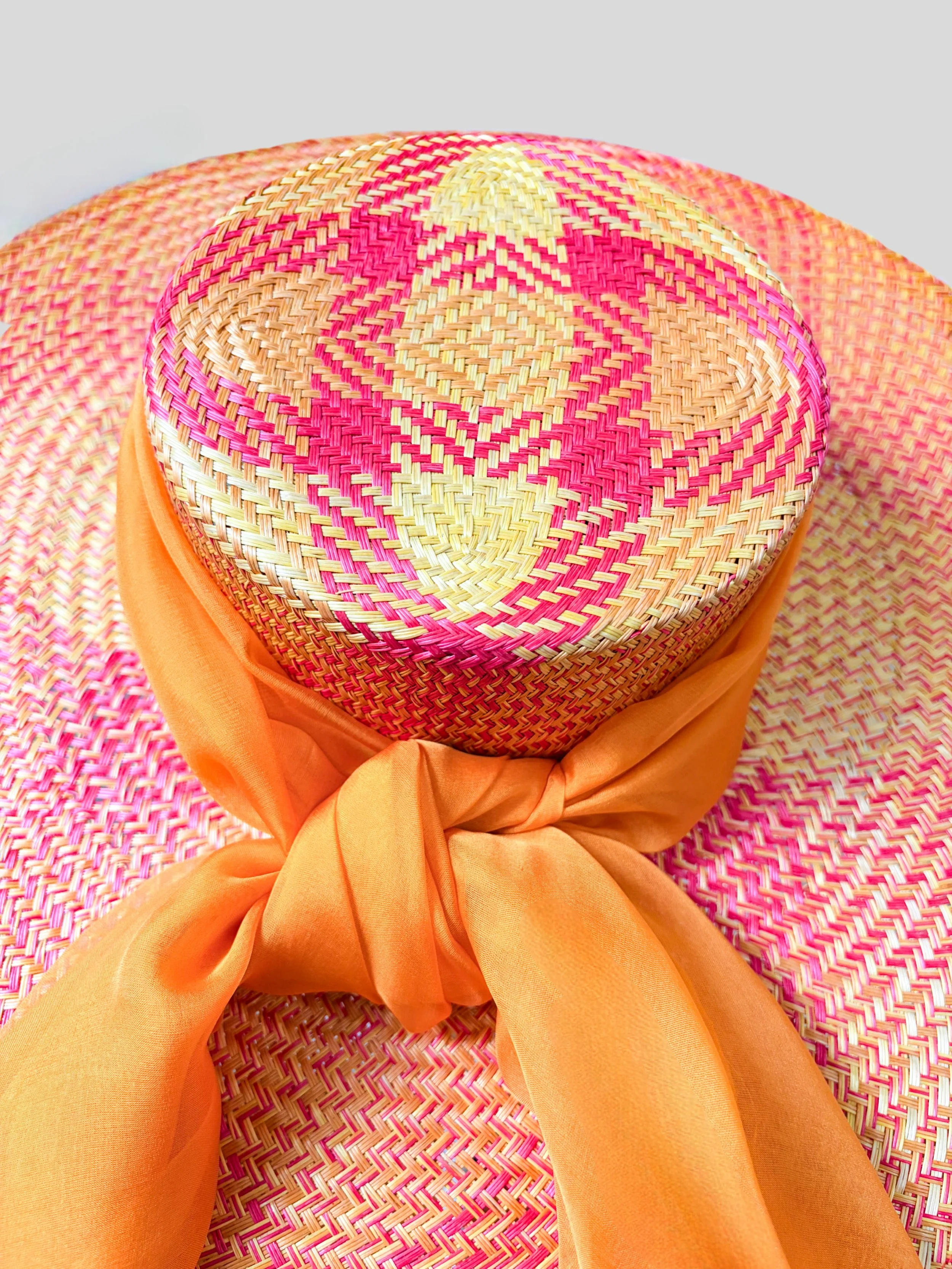 orange-pink-wide-brim-hat-close-up-view.jpg