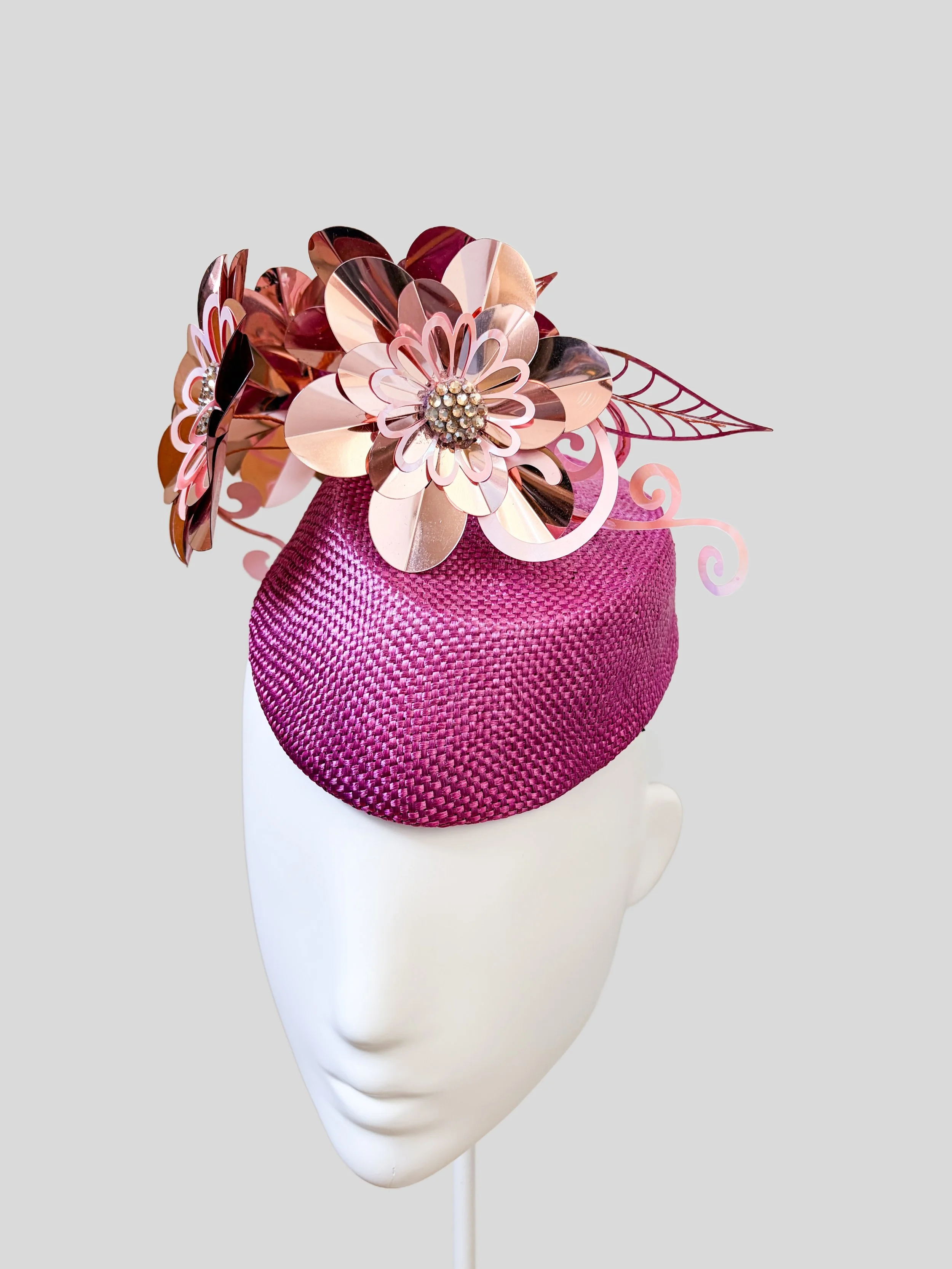Right: Aurelia Orchid metallic floral headpiece shown from the right side.