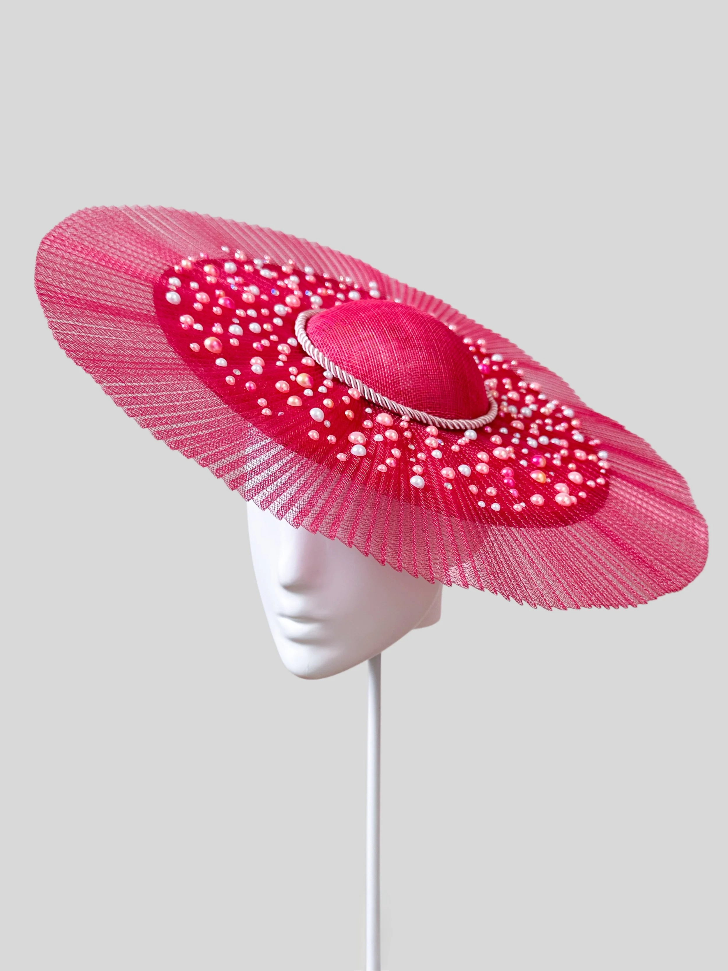 Right-side view of the Perles Roses hat, highlighting the graceful curve of the brim and the handbeaded pearl details. A glamorous accessory for any occasion.