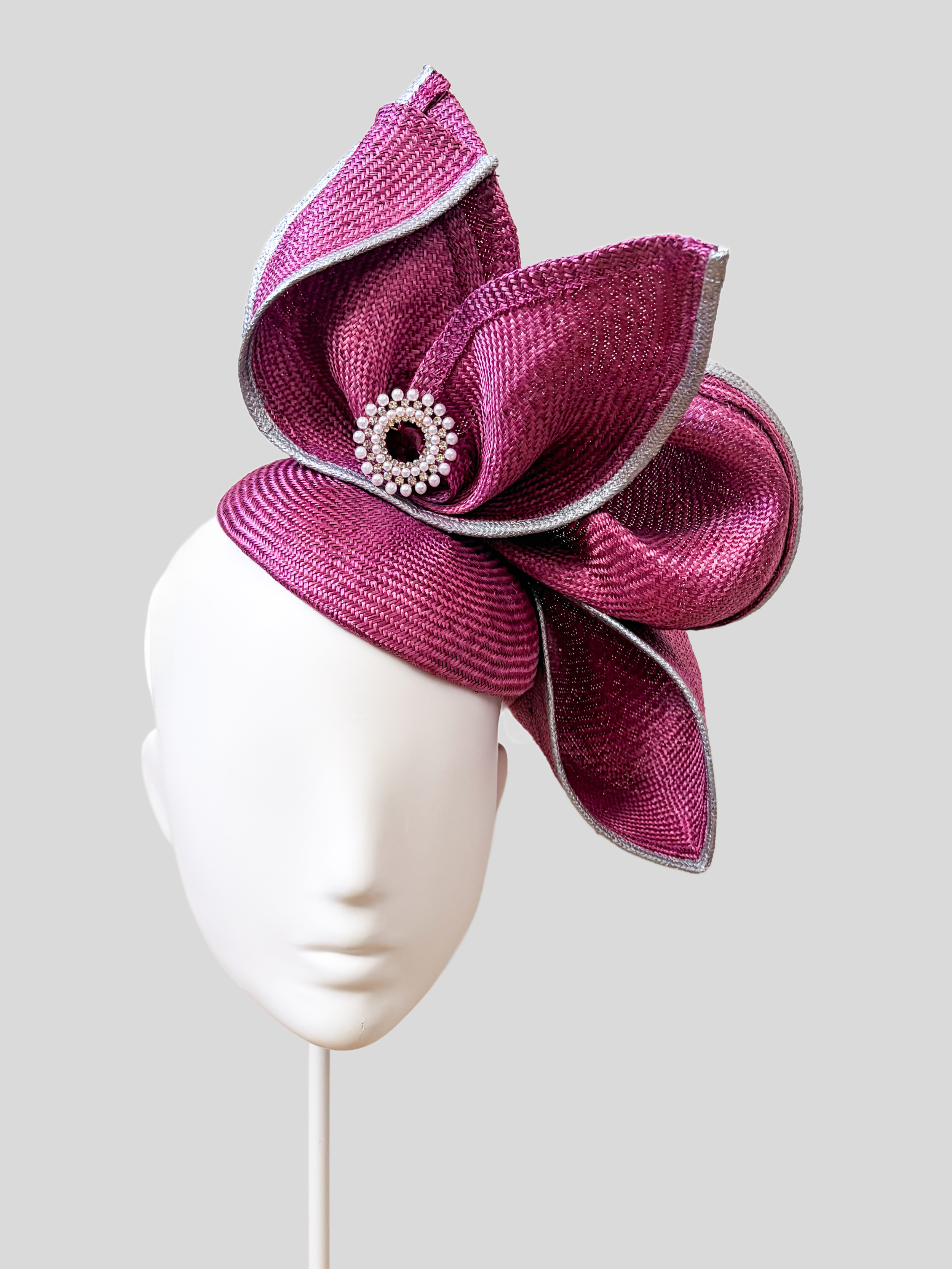 Aria Amethyst sculptural Parisisal headpiece in rich purple with silver metallic edging and pearl embellishment.