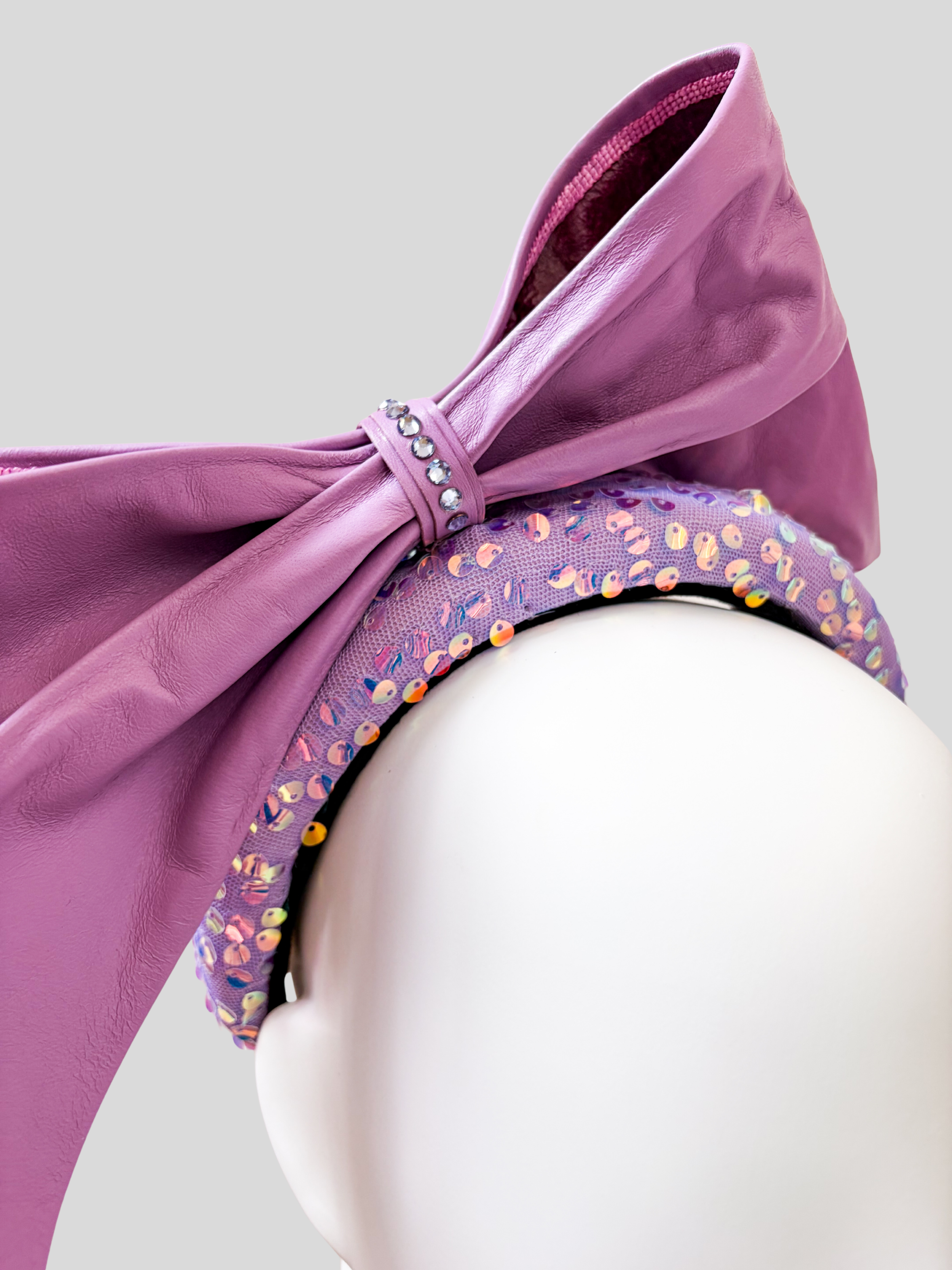 purple-bow-headpiece-close-up.jpg.png