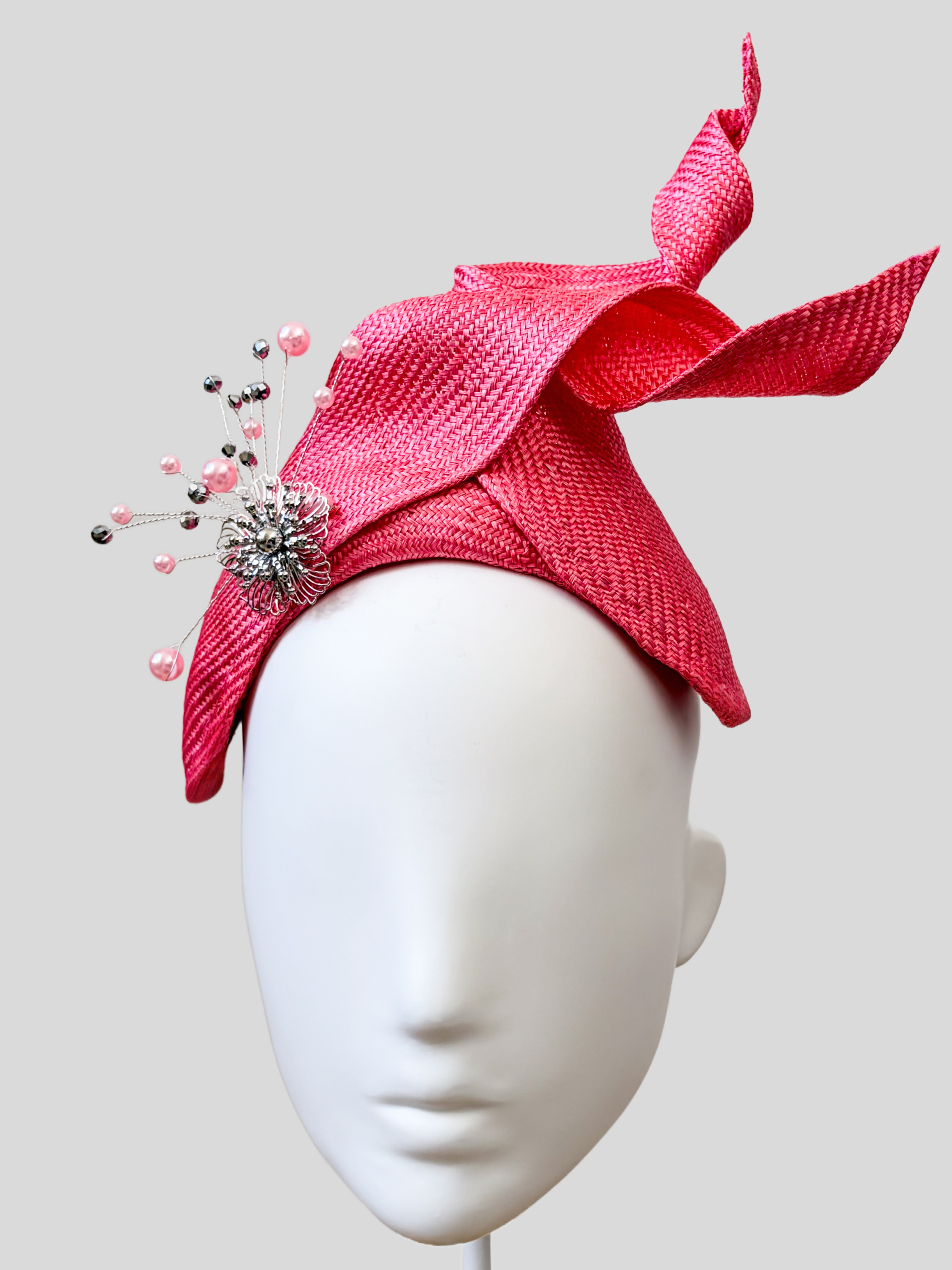 Close-up: Close-up of the hand-applied silver embellishment featuring pearls and delicate silver bead detailing on the SÉLÈNE Rose headband.