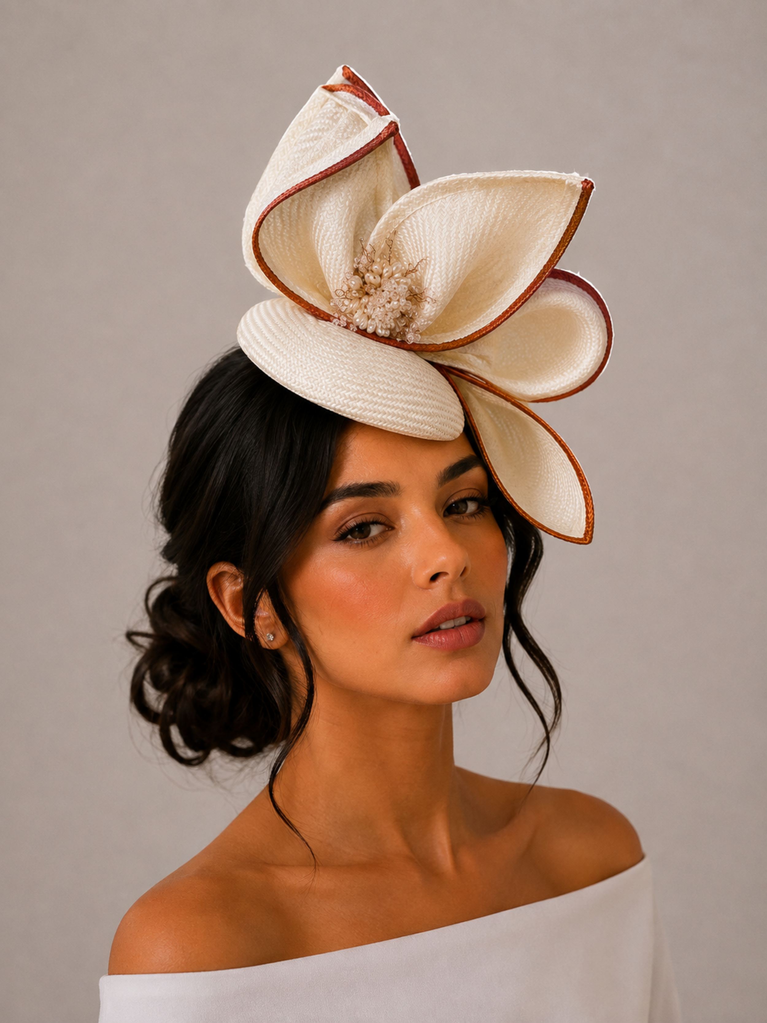 Aria Ivory sculptural headpiece styled on a model.