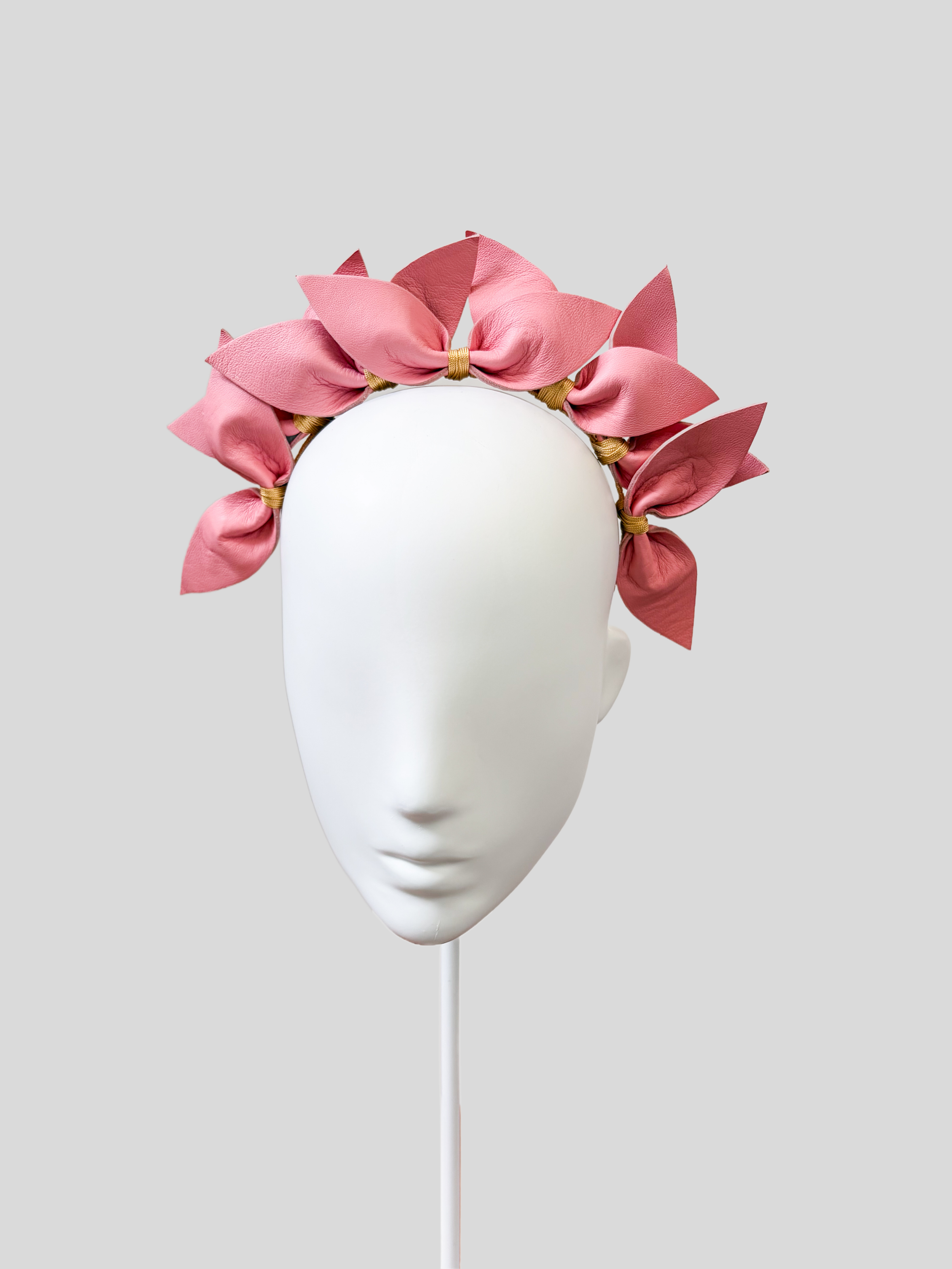 pink-leather-flower-headband-front-view.jpg.png