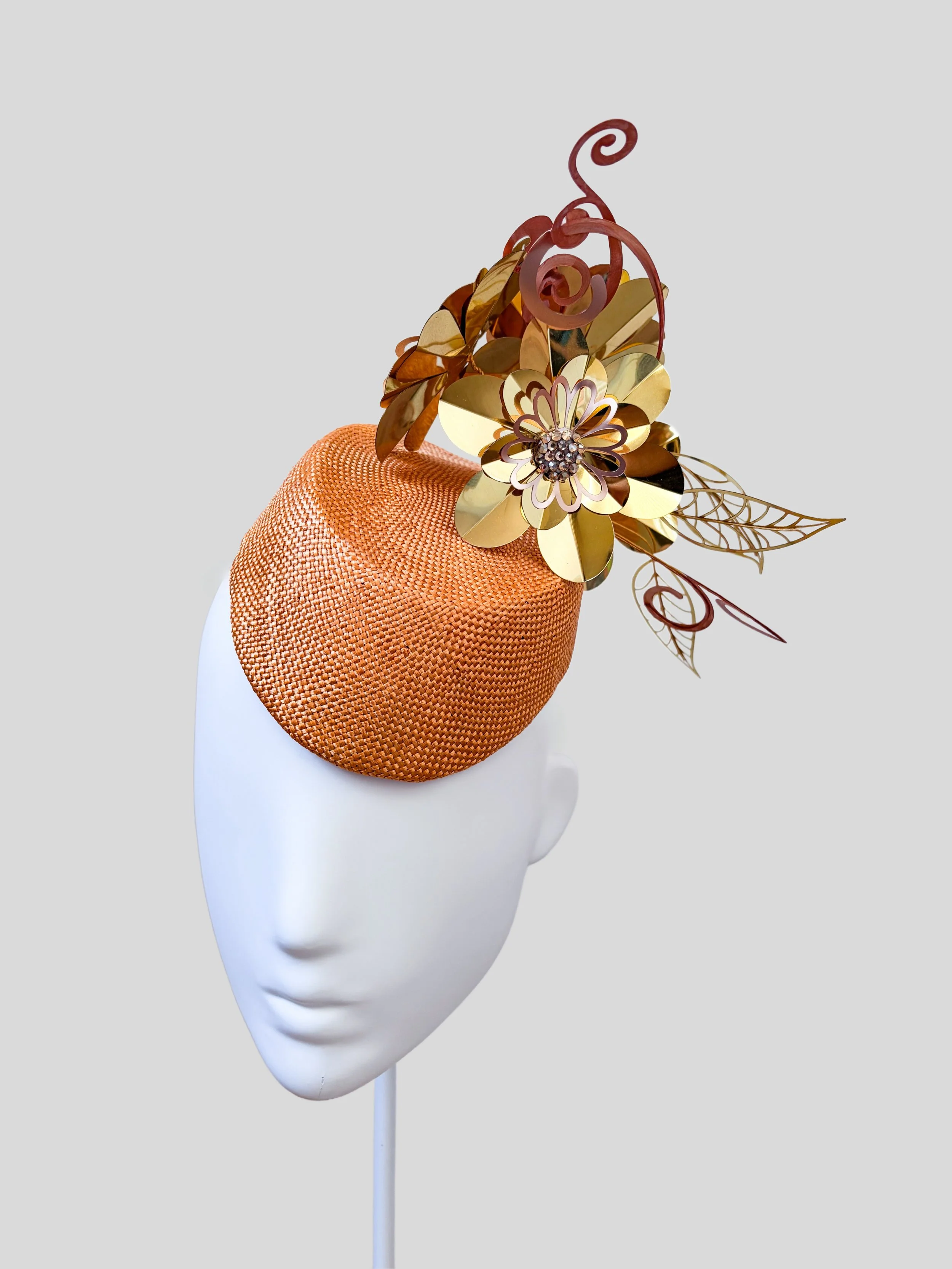 Right: Aurelia Gilded metallic floral headpiece shown from the right side.