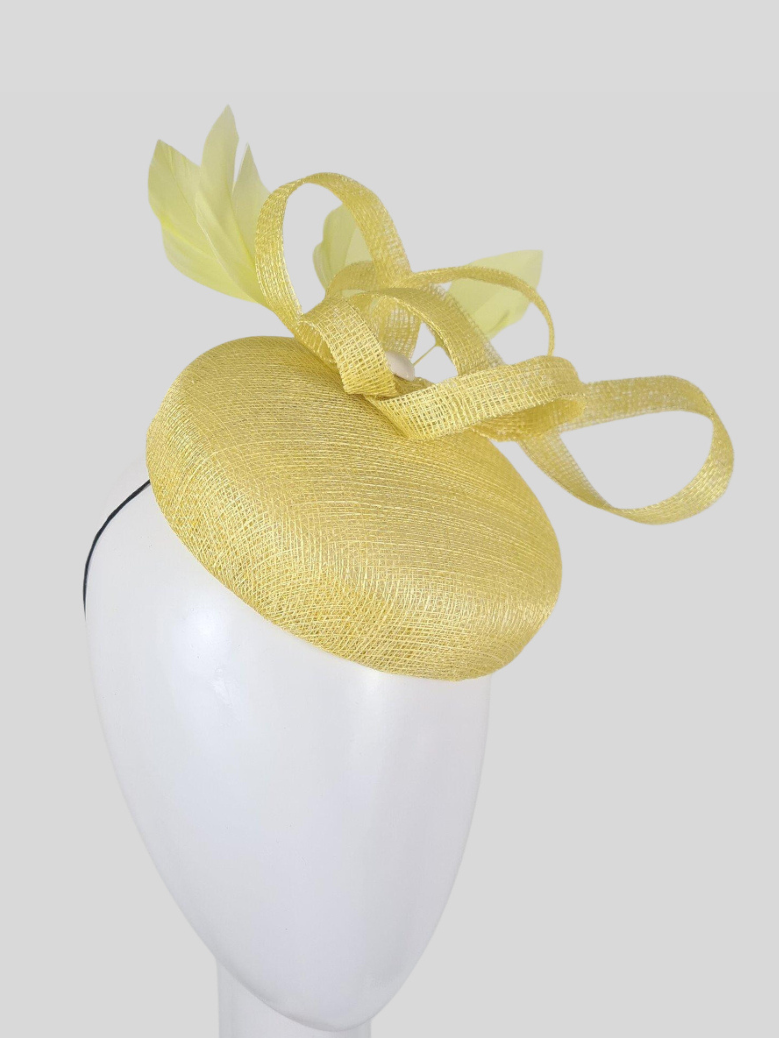 abril-sinamay-cocktail-hat-light-yellow- left-view.png