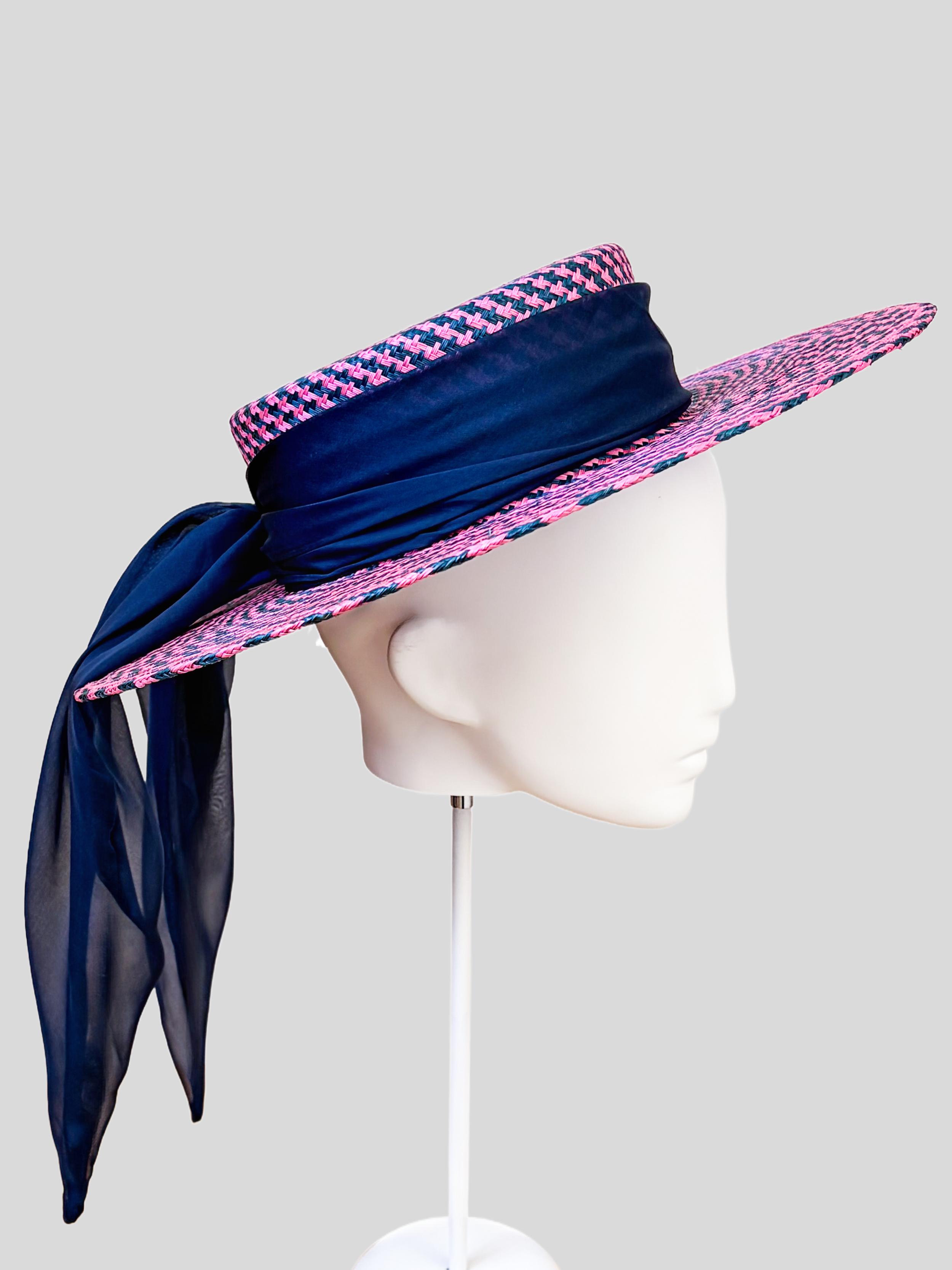 Solara Cerise woven boater hat shown from the left side.