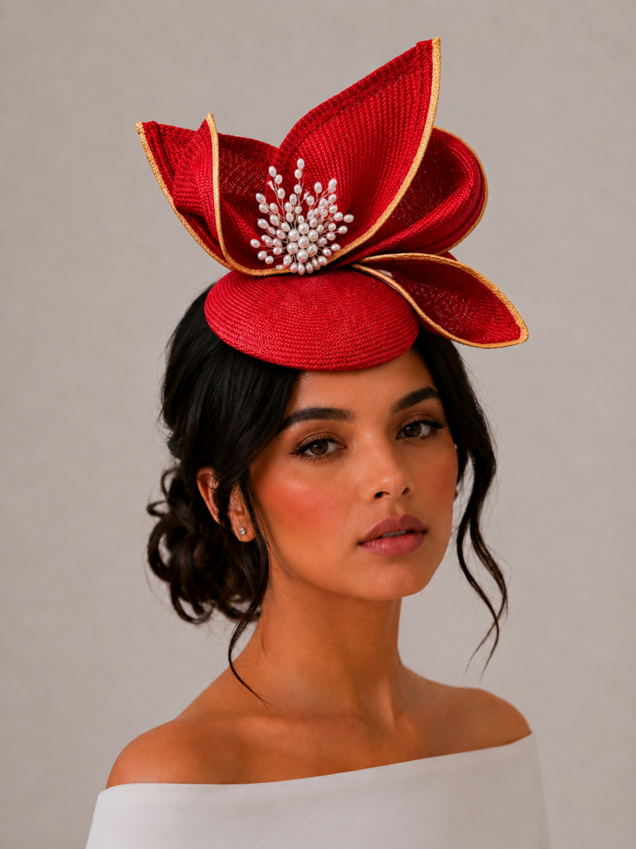 Aria Ruby sculptural headpiece styled on a model.