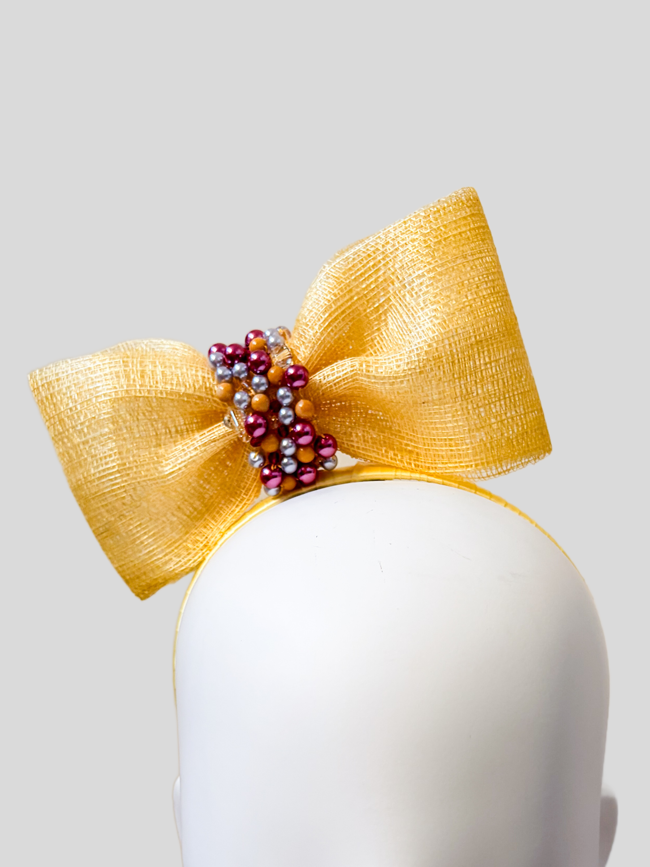 yellow-sinamay-headband-bow-swarovski-beads-close-up-view.jpg.png