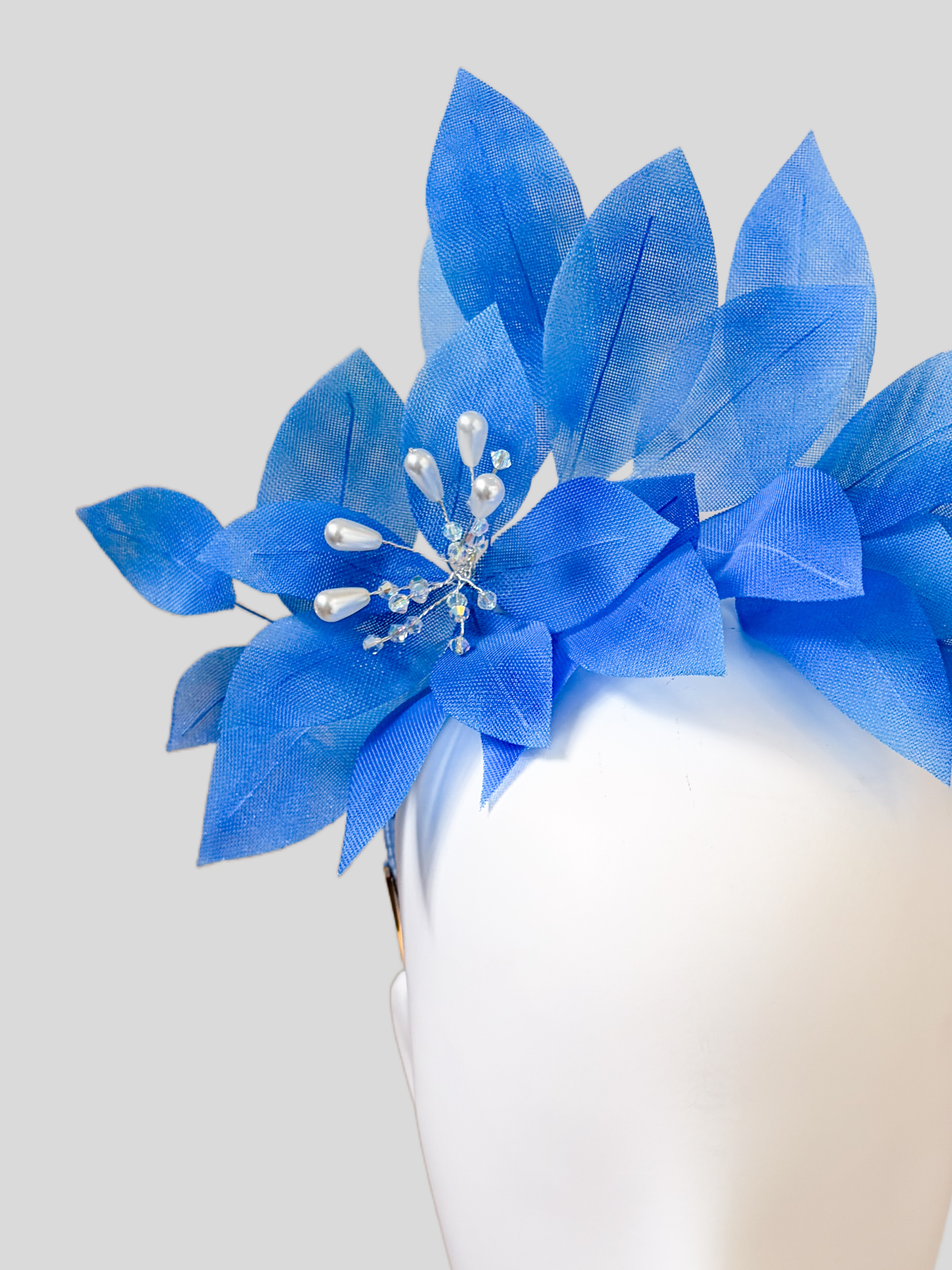 Detail: Azure floral headband embellishment