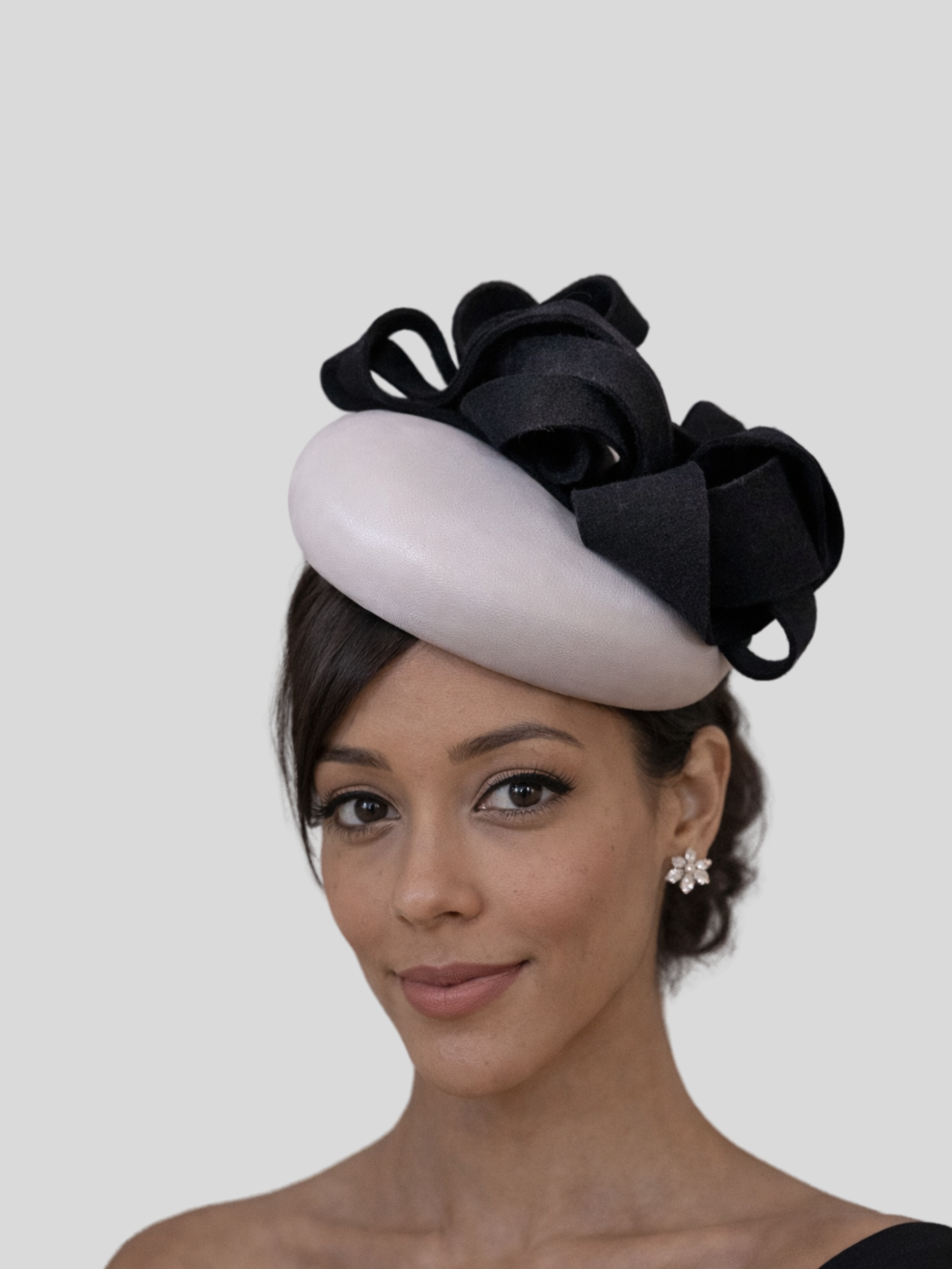 chiara-black-grey-wool-felt--leather-fascinator-model-view.jpg.png