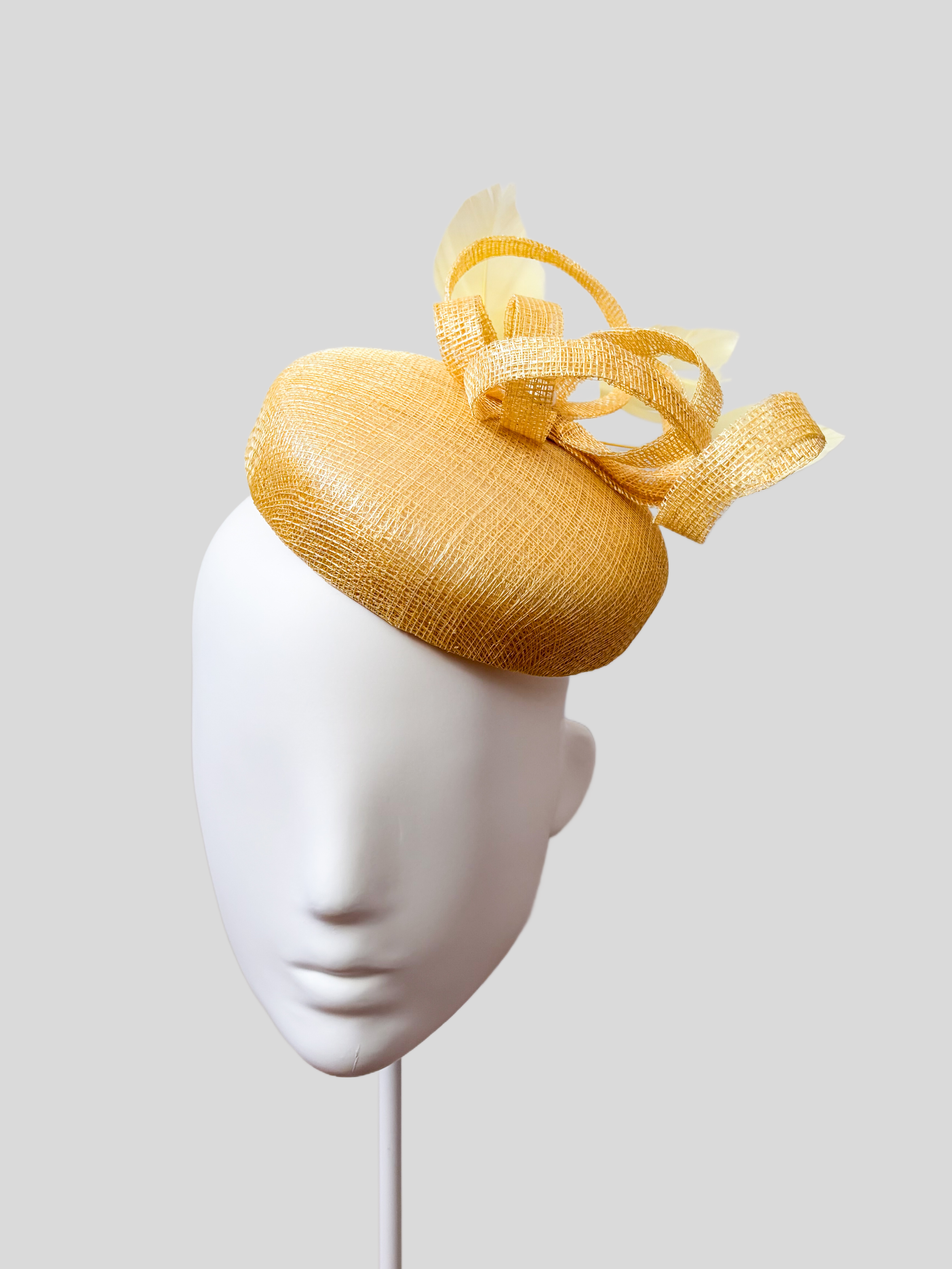 yellow-sinamay-fascinator-loops-feather-racewear-front.jpg.png