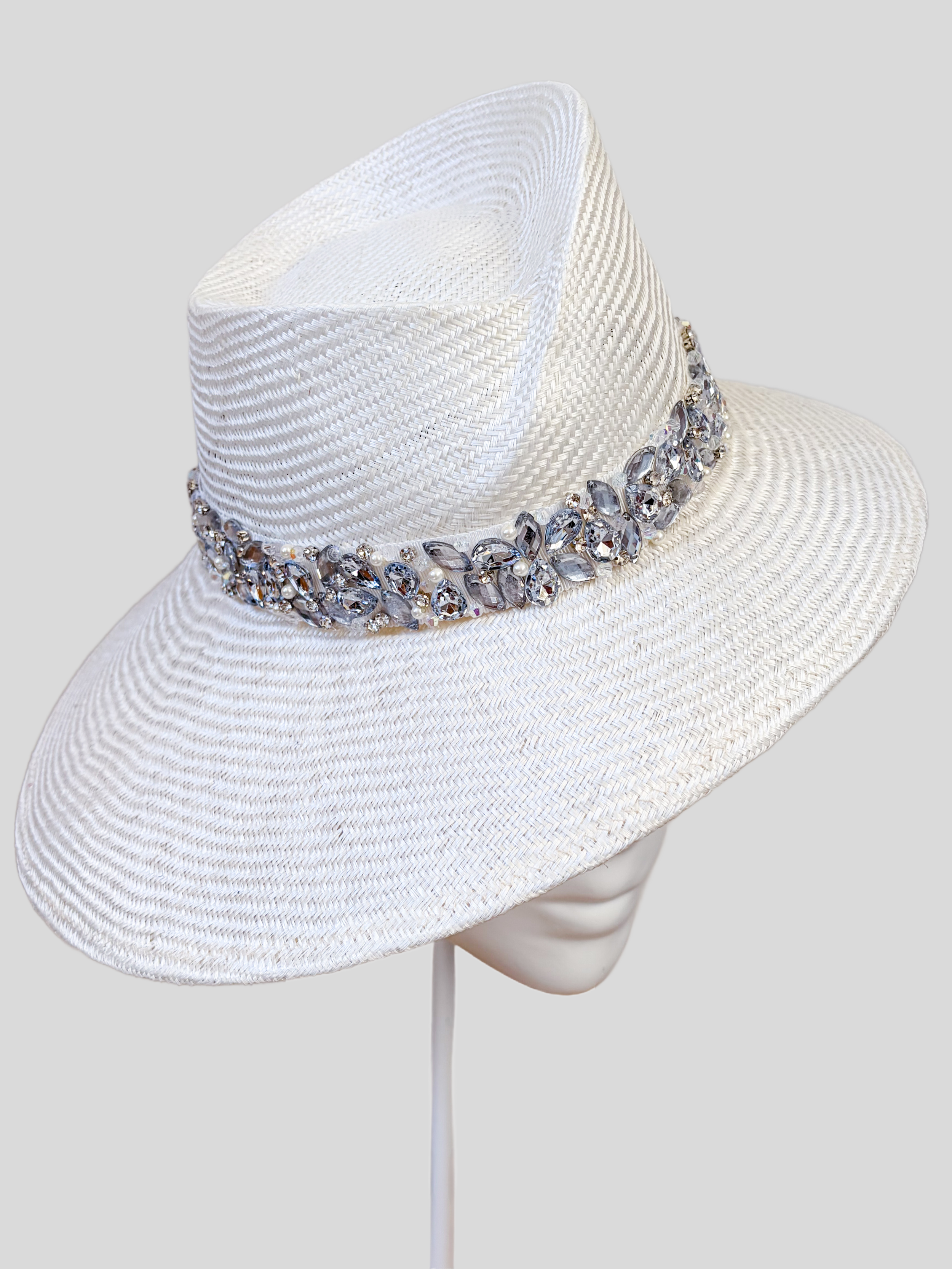 Close-up: Close-up of the hand-embellished clear and silver beaded band on the MAISON Pearl Parisisal fedora.