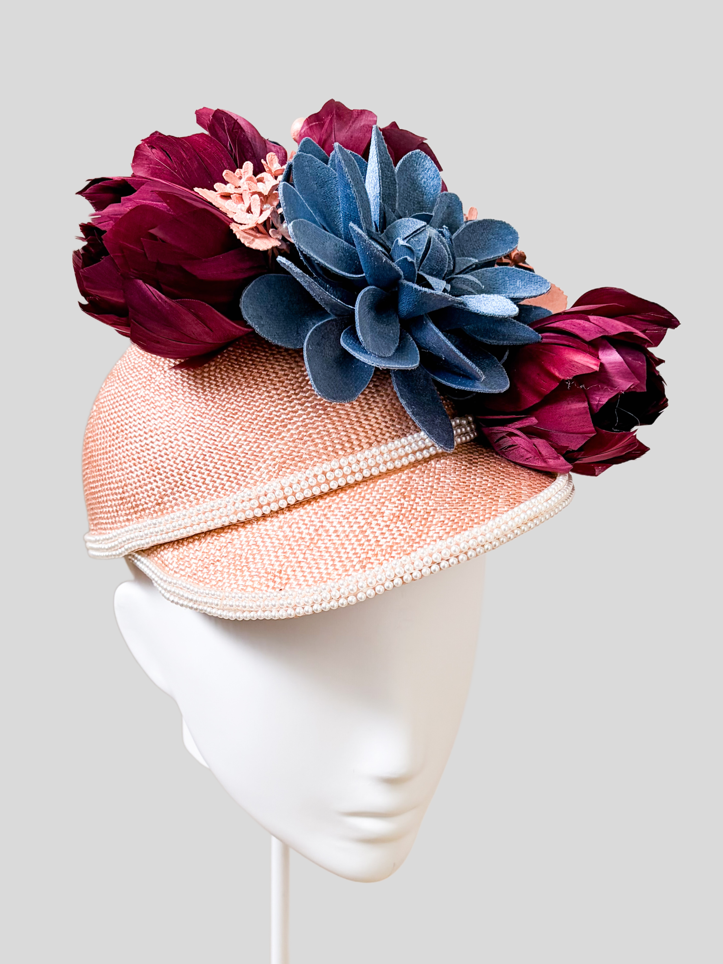 Left: Rosalie Rose floral jockey cap shown from the left side.