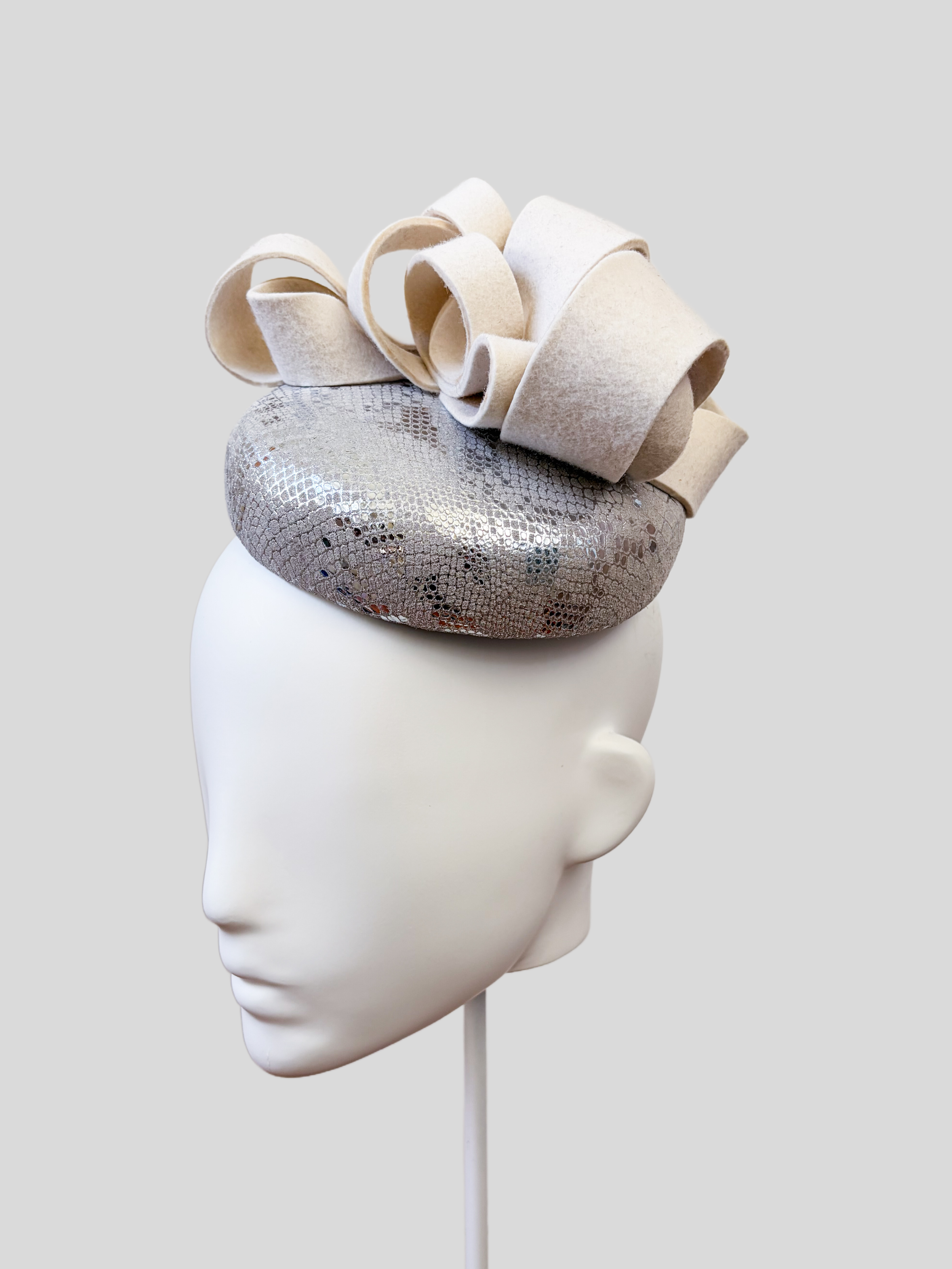 chiara-silver-white-wool-felt--leather-fascinator-right-view.jpg.png