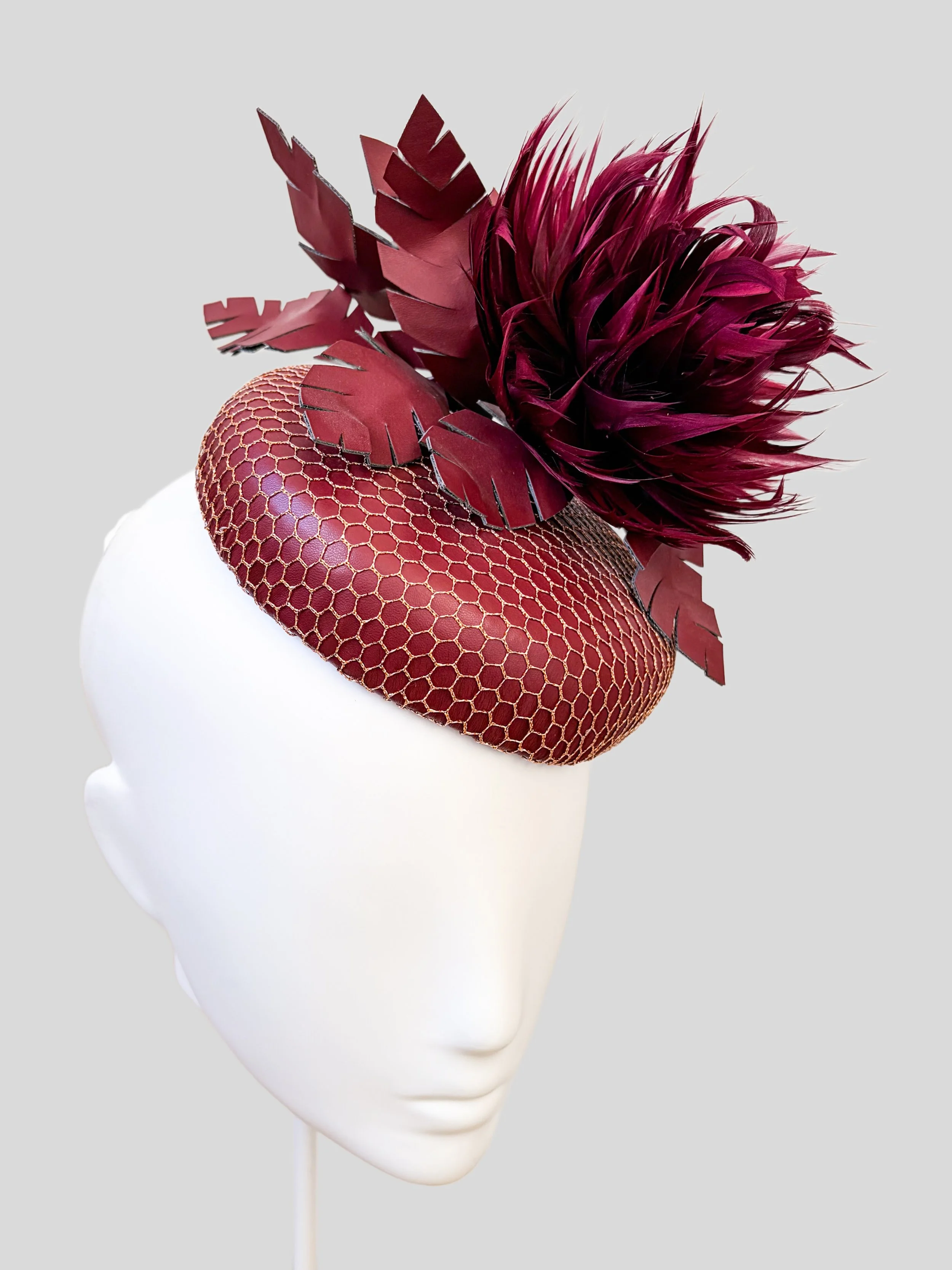 nocturne-amethyst-purple-feather-cocktail-hat-left-side.jpg
