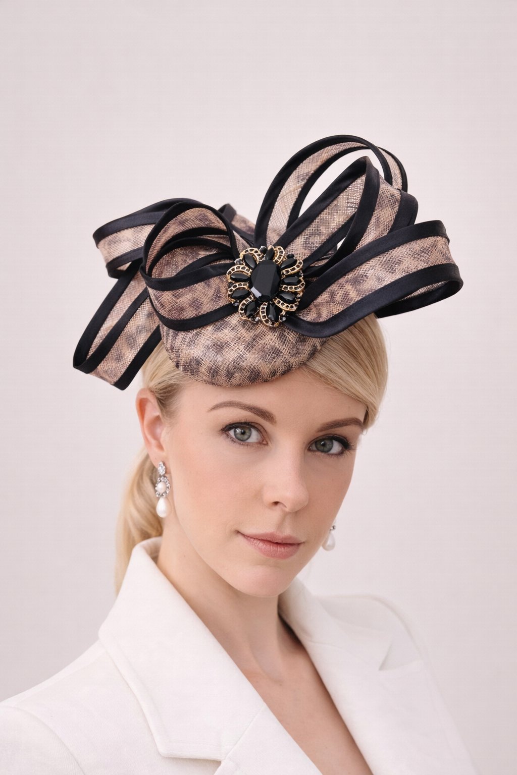 Elegant woman with leopard-print fascinator.JPEG
