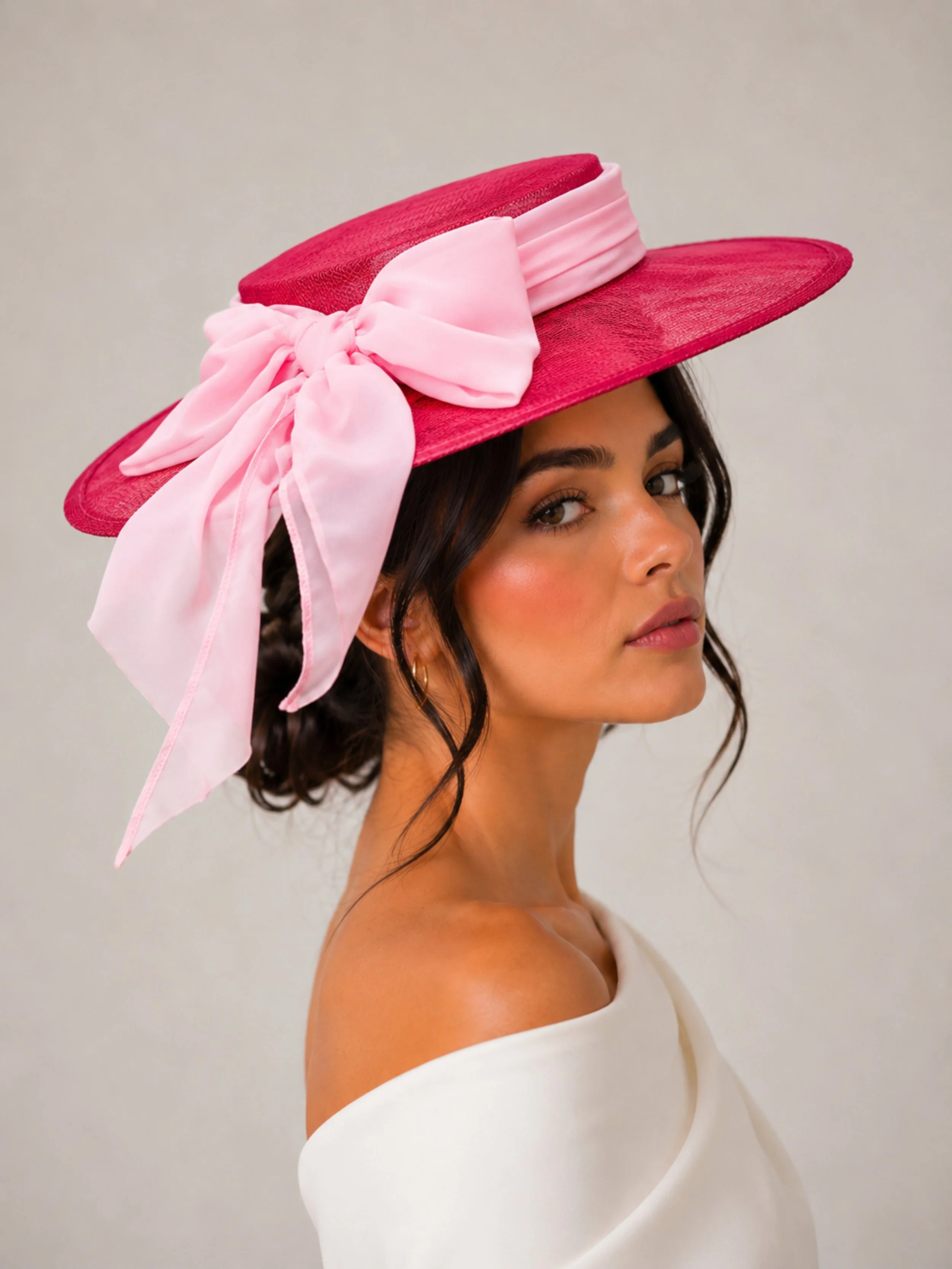 rosela-fuchsia-sinamay-boater-hat-model.jpg