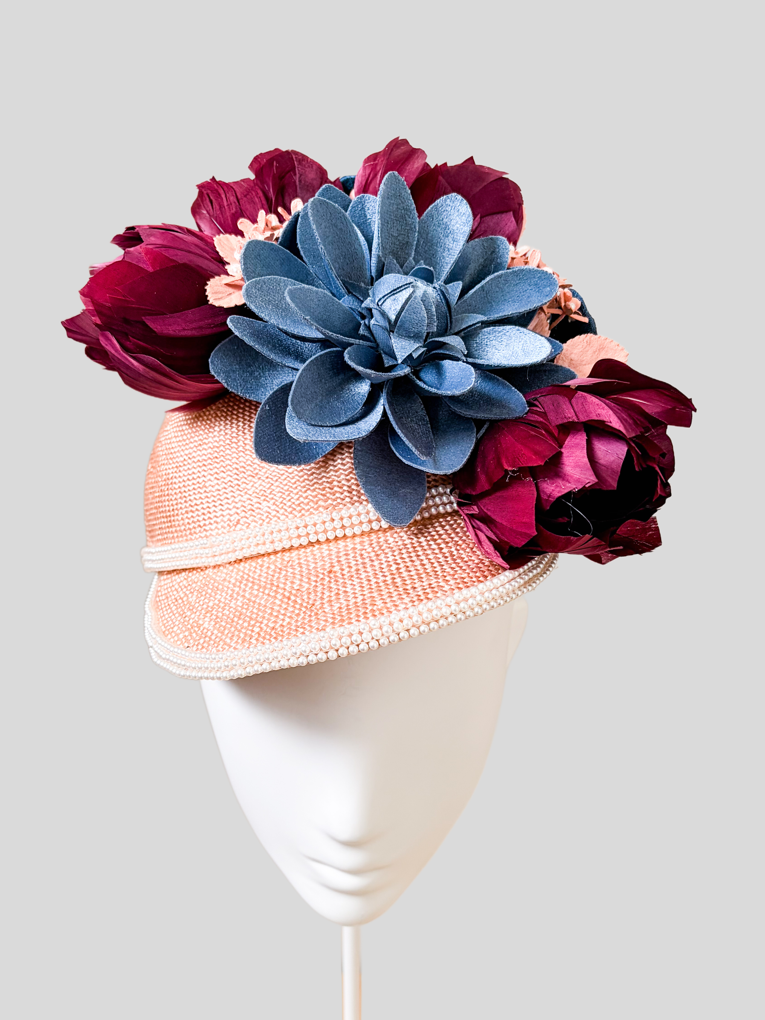 Front: Rosalie Rose floral jockey-inspired cap with handcrafted flowers.