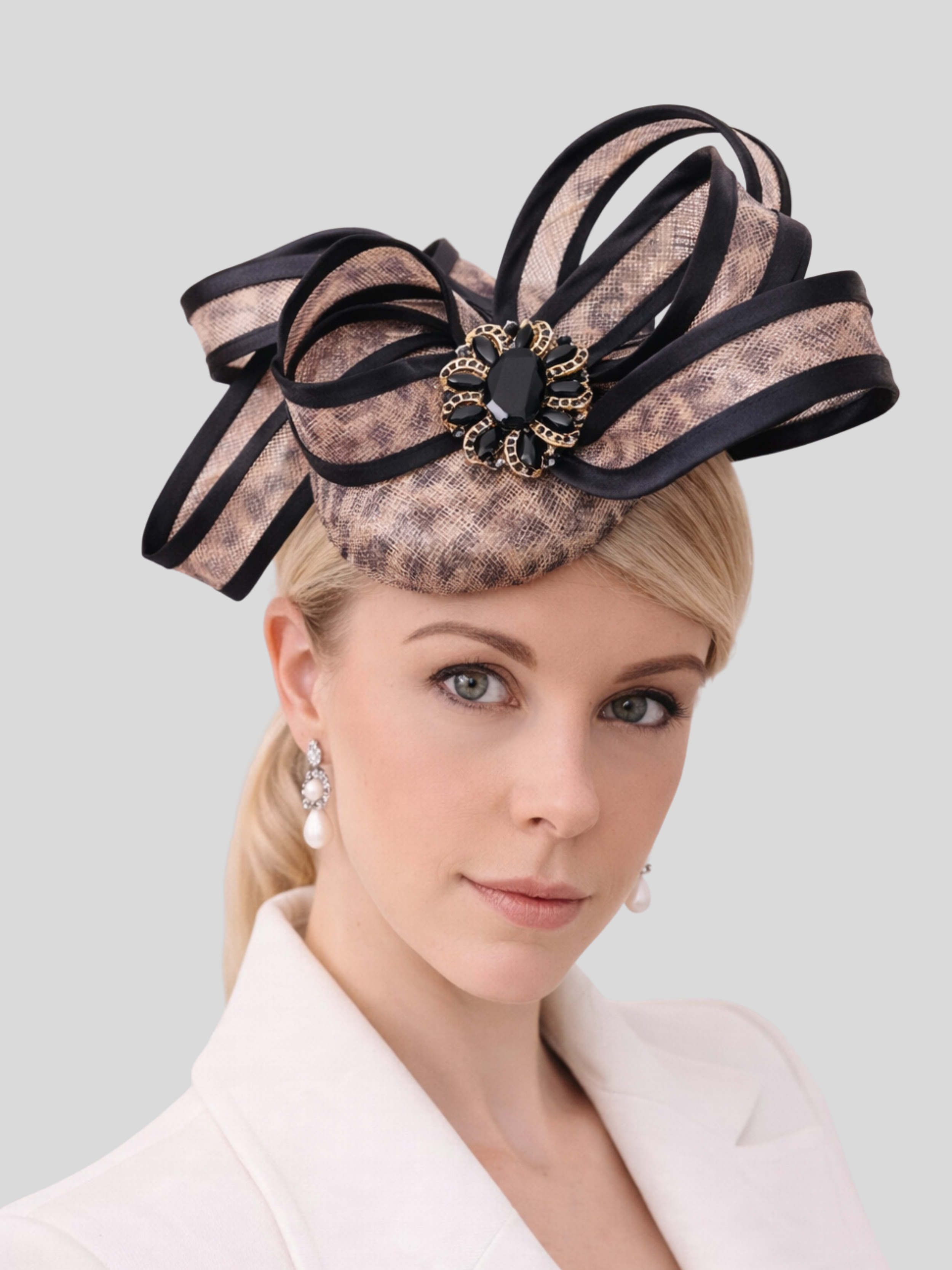 leopard-sinamay-fascinator-on-model-racewear.jpg.png