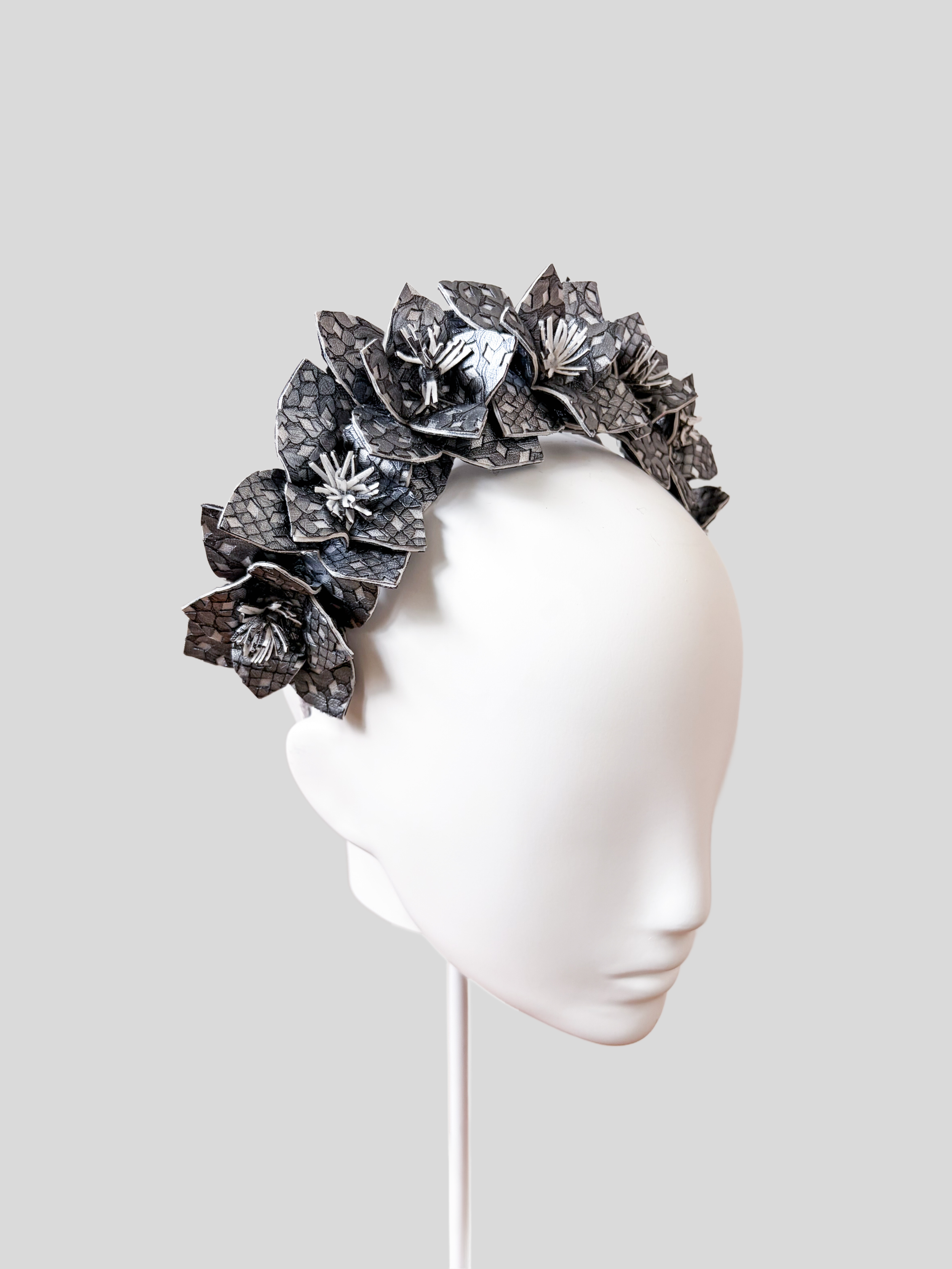 silver-textured-faux-leather-floral-headband-left-view.jpg.png