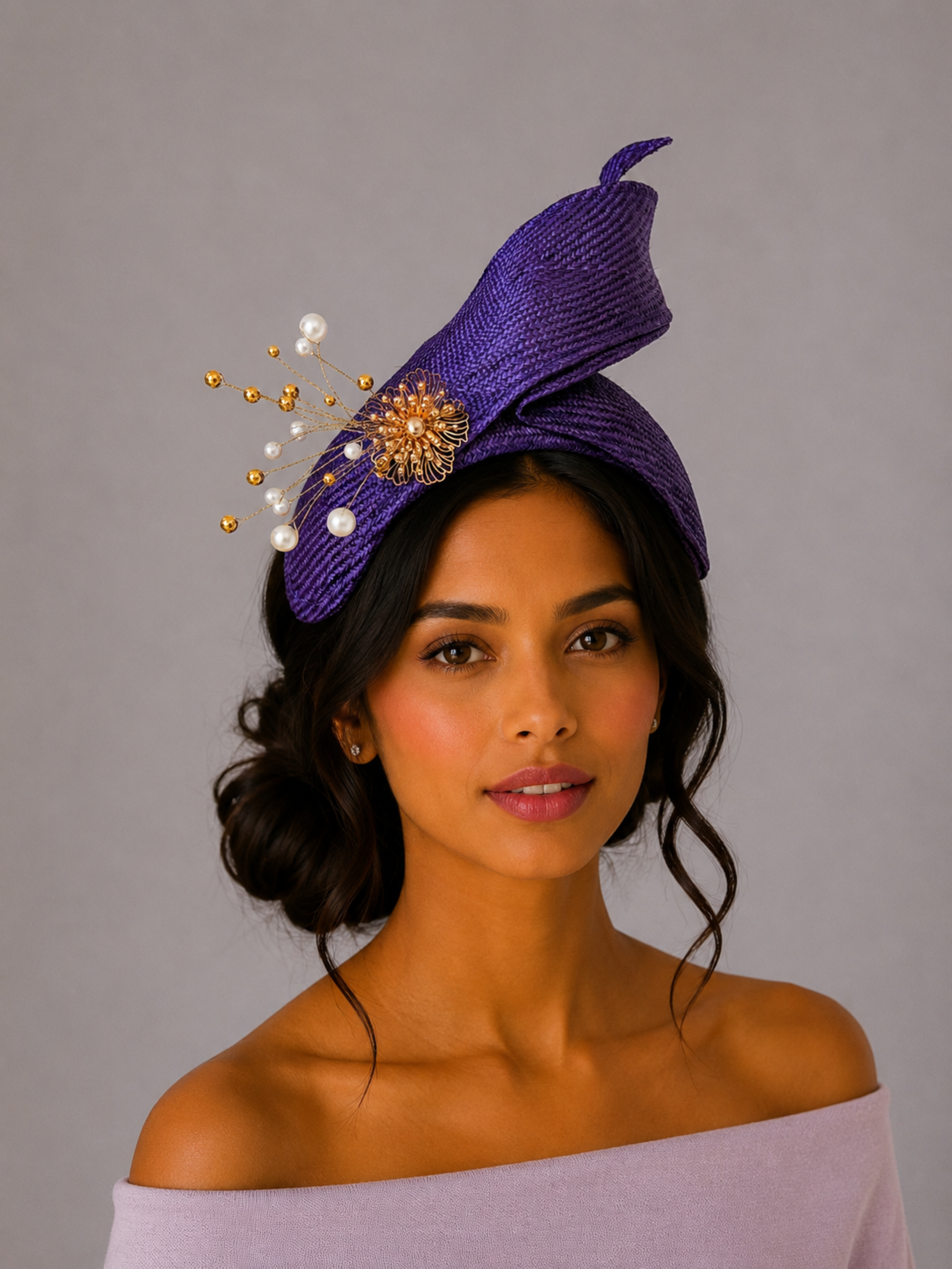 Model: SÉLÈNE Amethyst Parisisal bandeau headband styled on a model, showcasing its sculptural profile and gold embellishment.