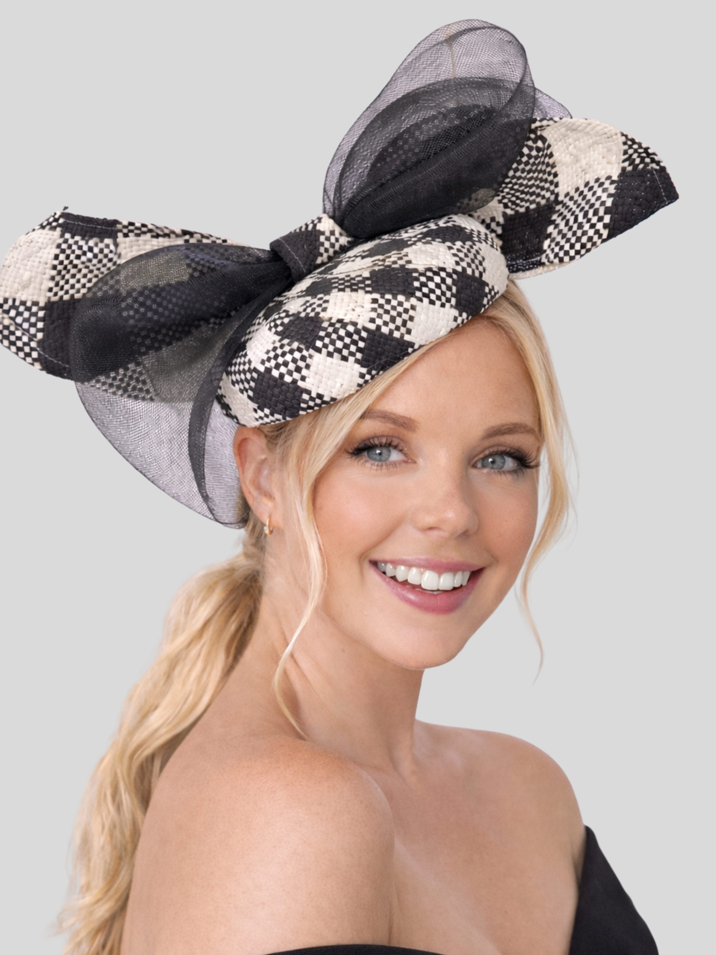 black-white-checkered-fascinator-on-model-racewear.jpg.png