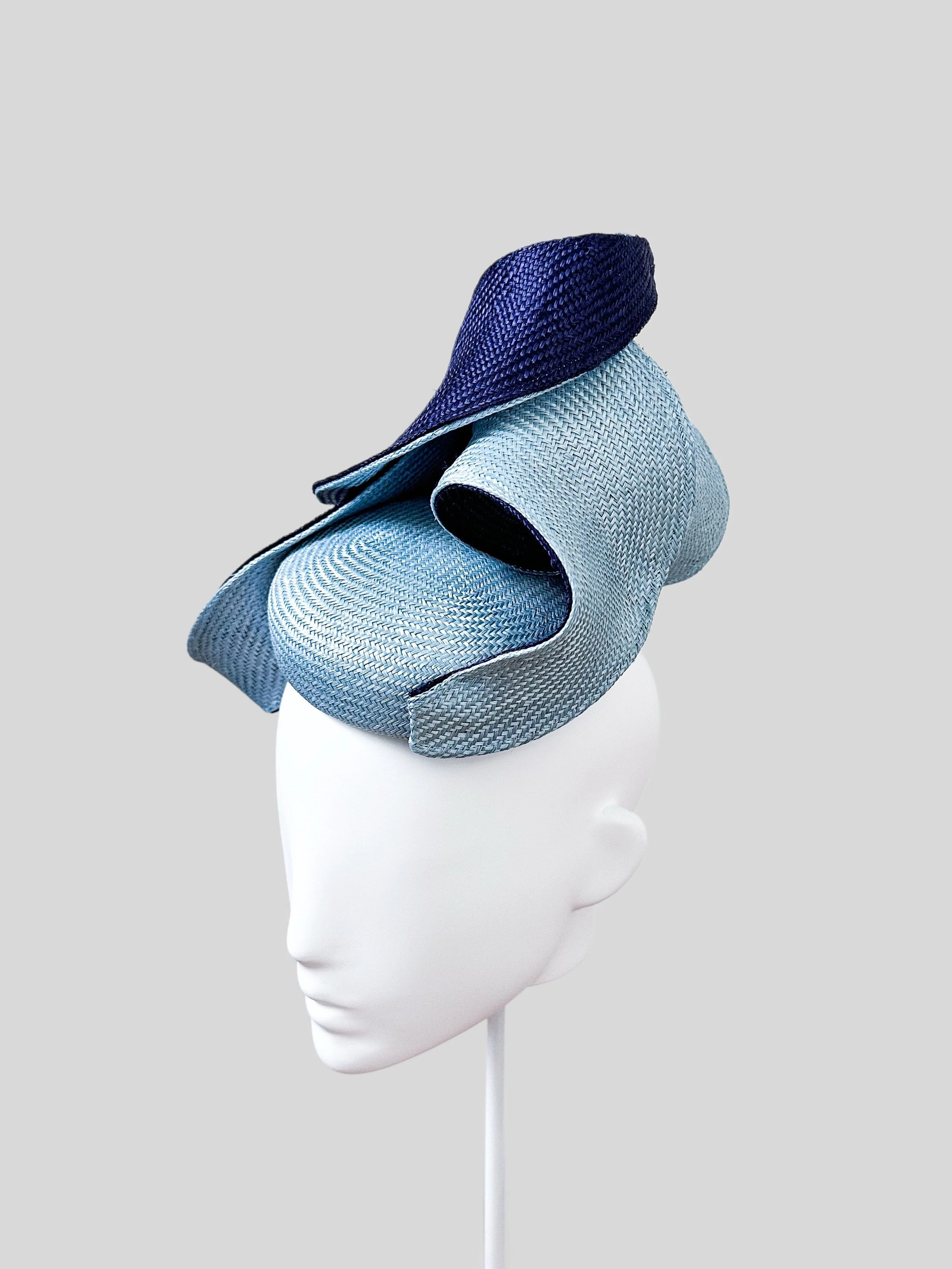 View the right side of the "Blu Profondo" baby blue Parisisal cocktail hat. Beautiful blue tones of this exquisite piece.