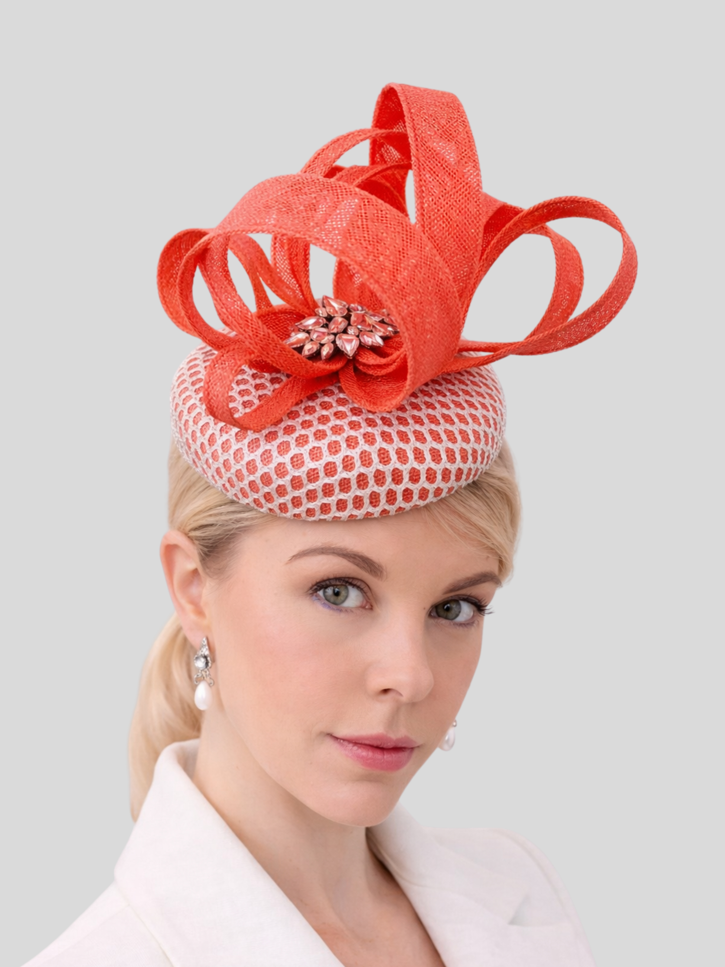 coral-sinamay-fascinator-on-model-racewear.jpg.png