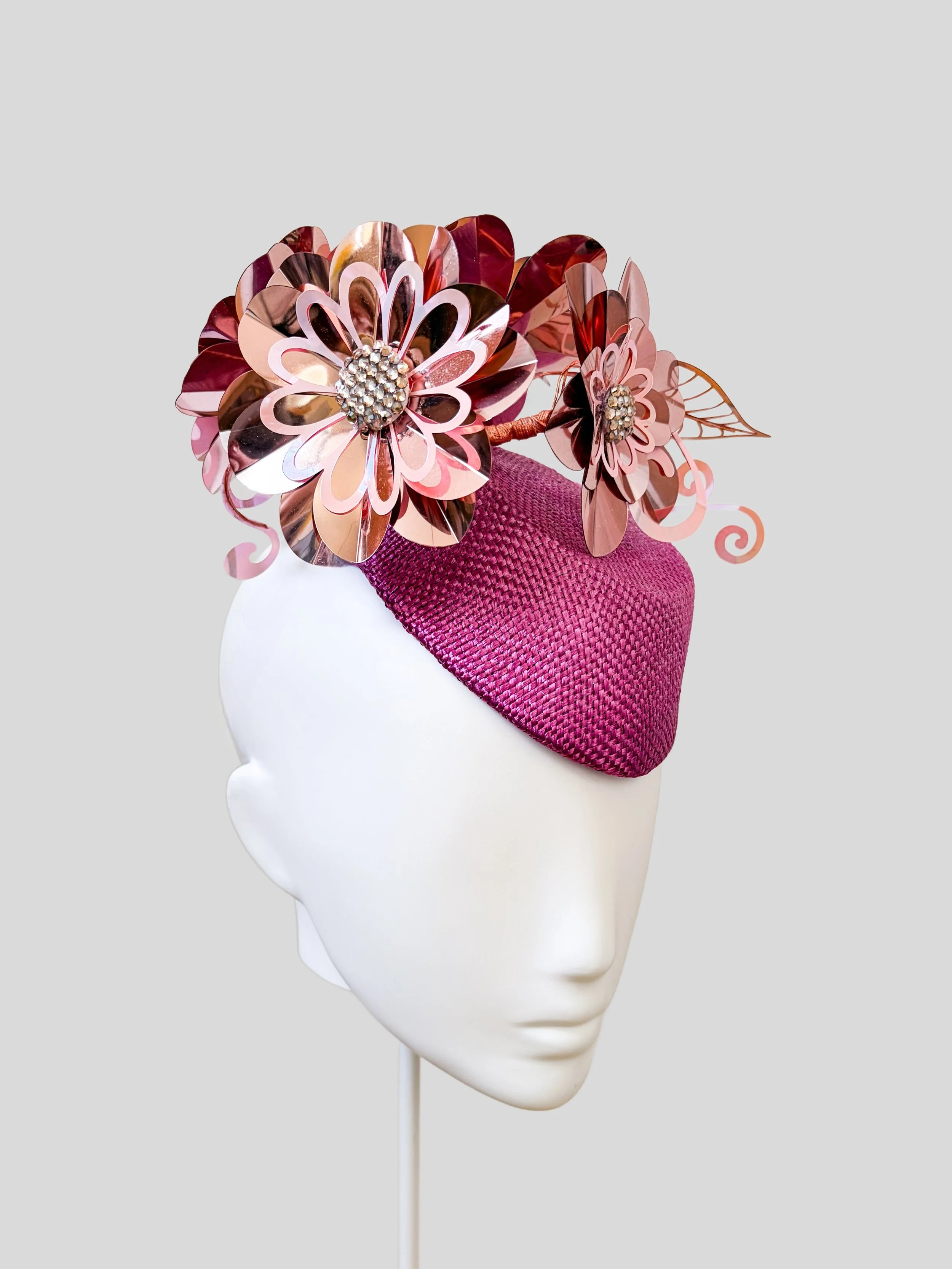 Left: Aurelia Orchid metallic floral headpiece shown from the left side.