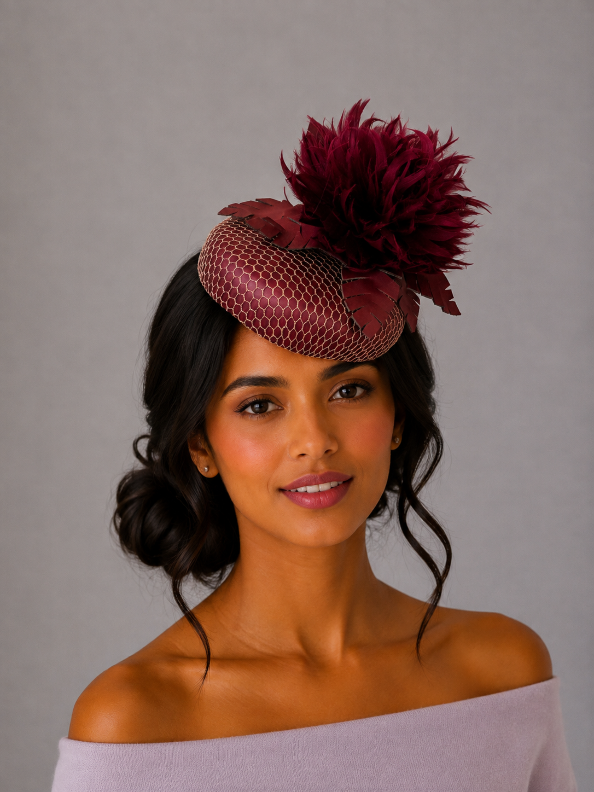 Model: Nocturne Amethyst purple feather cocktail hat styled on a model.