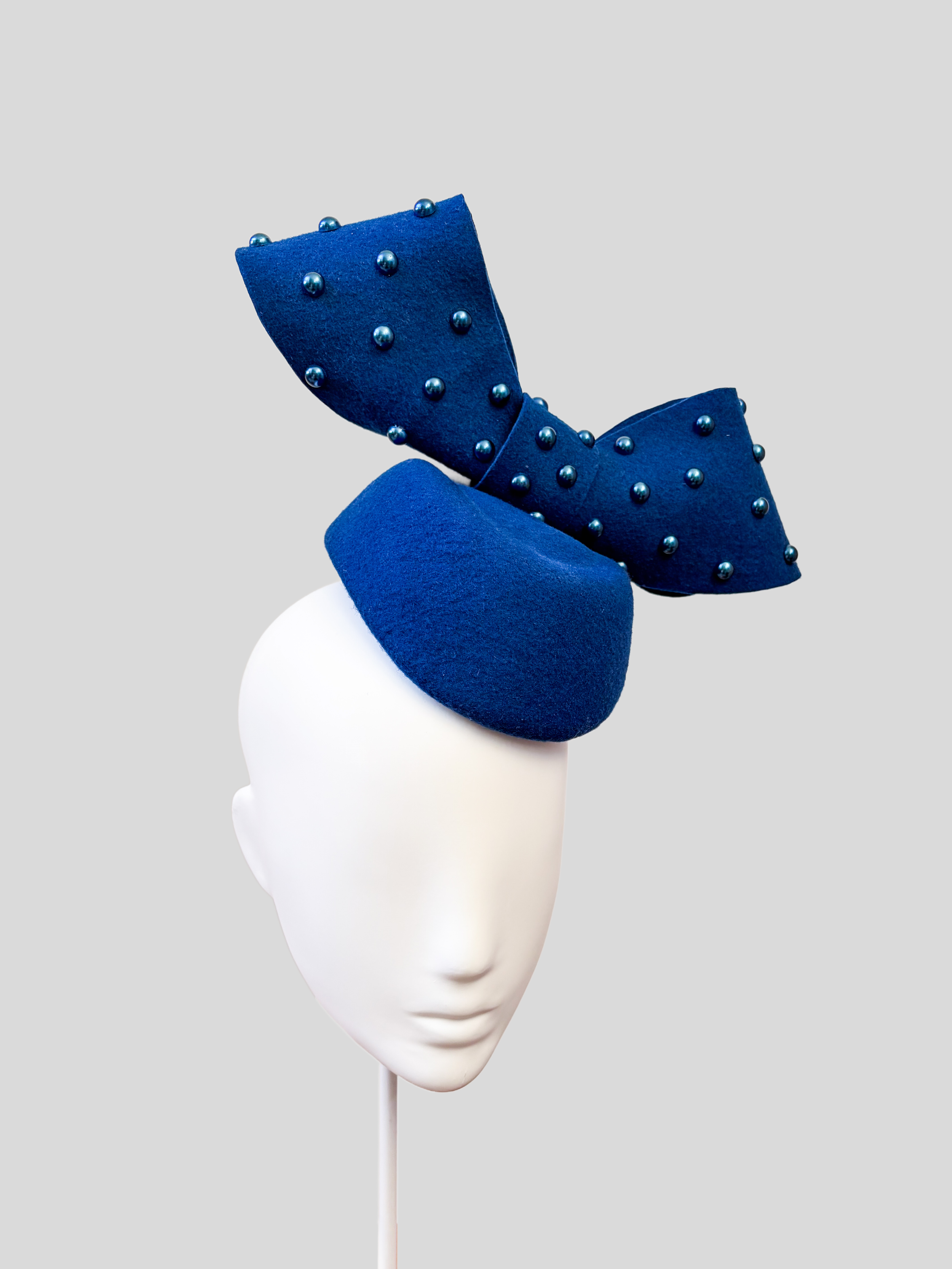 royal-blue-bow-fascinator-beaded-womens-racewear-hat-left-view.jpg.png