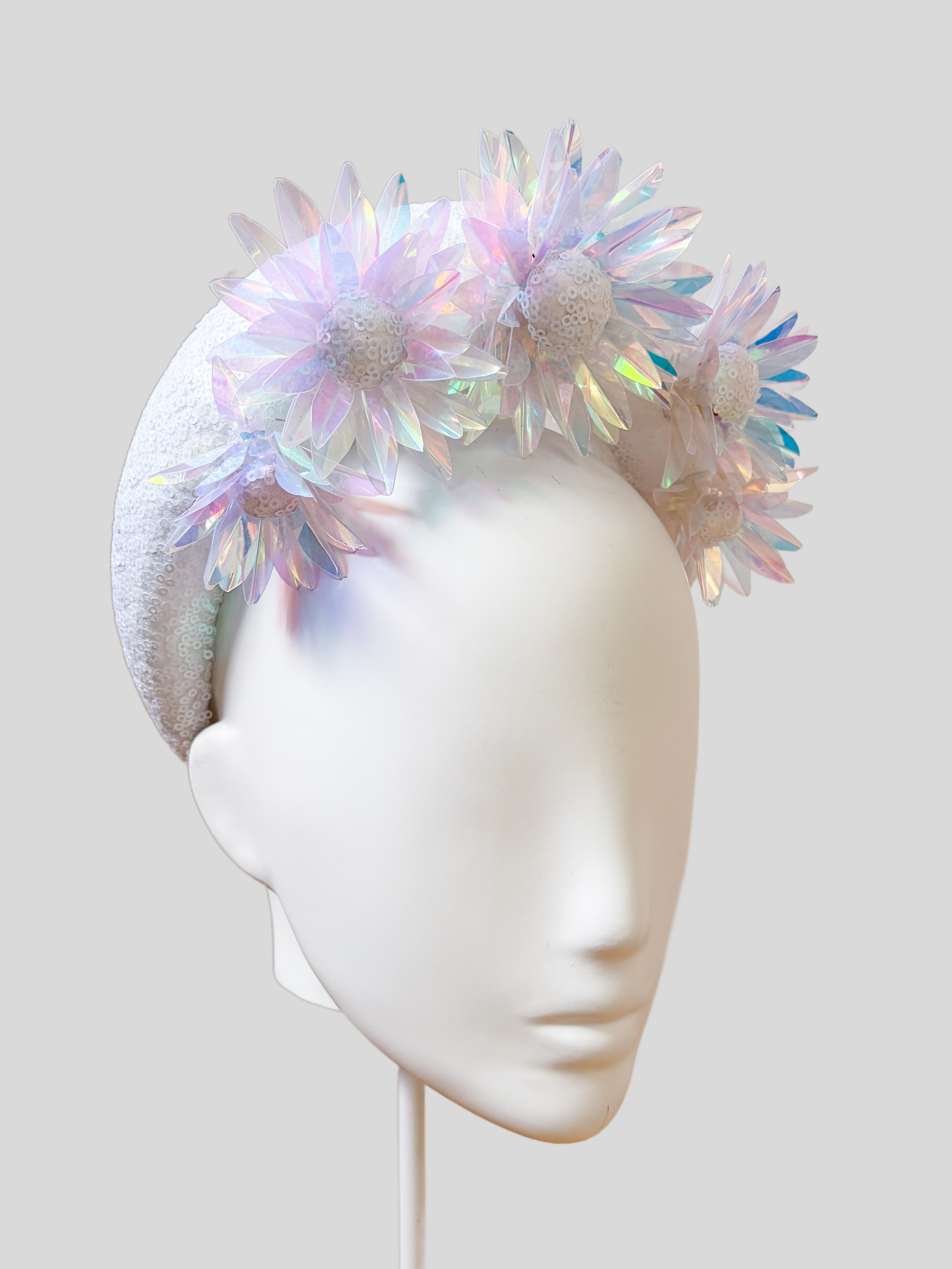 Left: LUMINA white floral halo headband side view