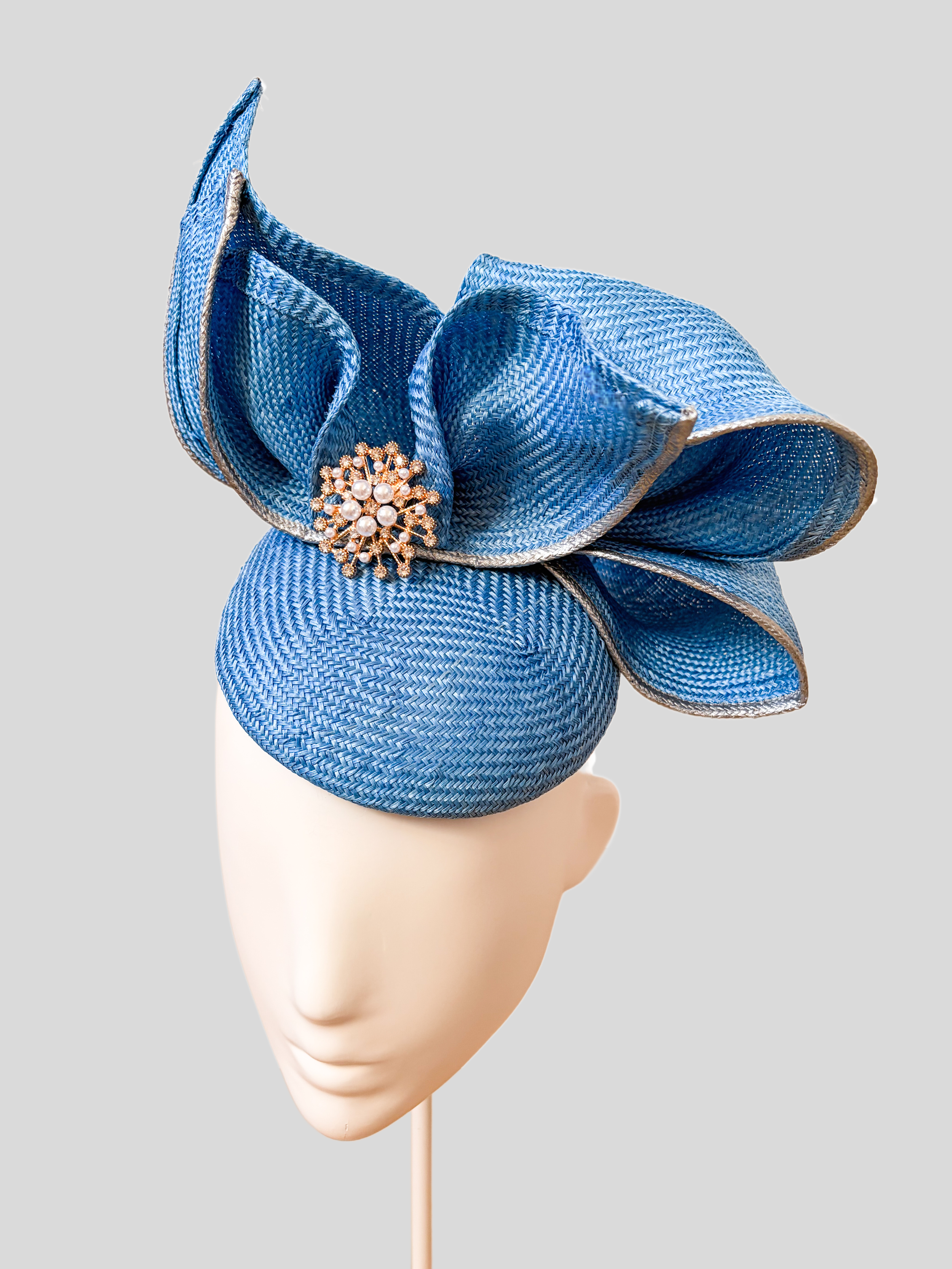 aria-sapphire-sculptural-parisisal-headpiece-right.png