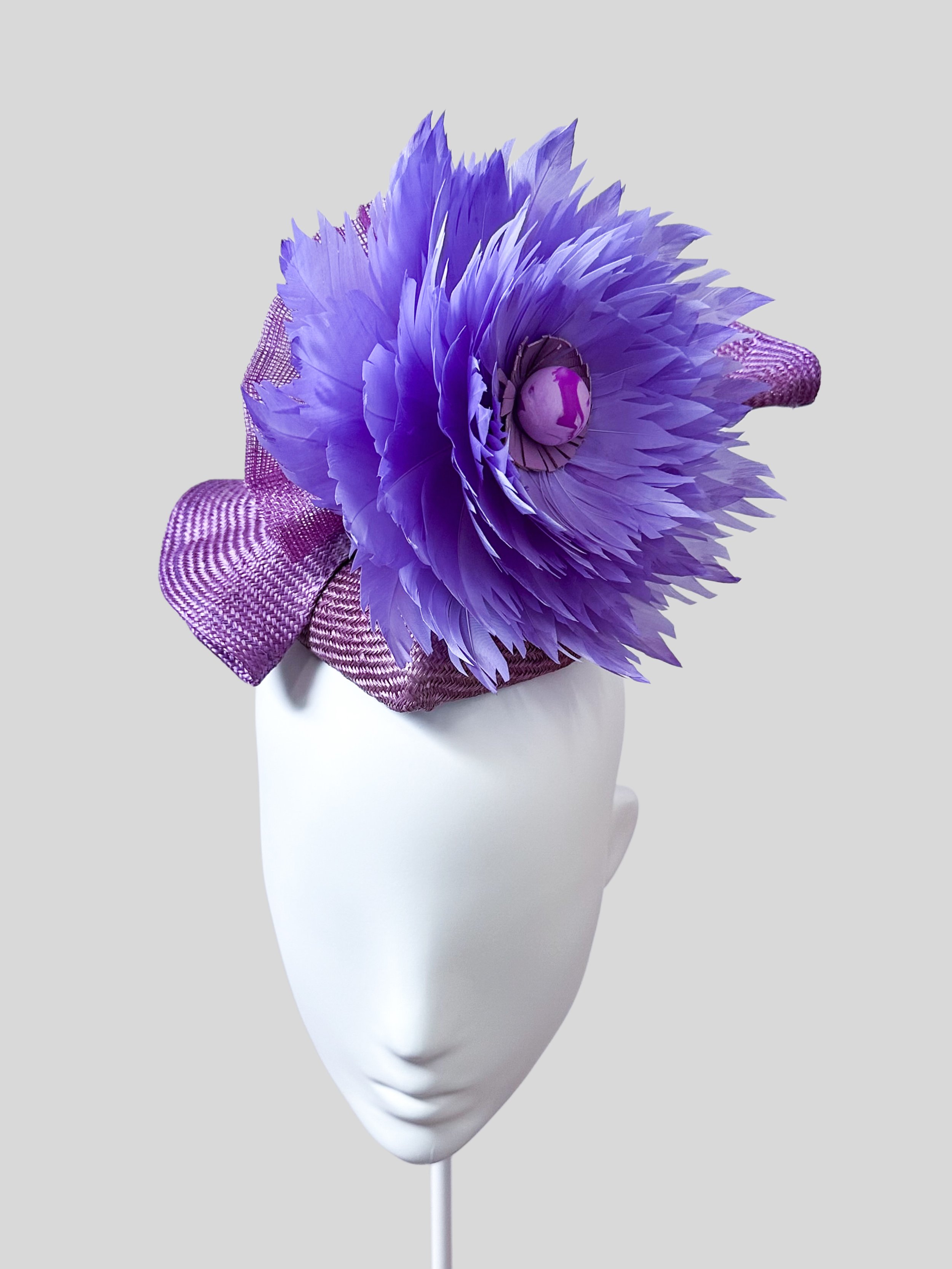 Front view of the Lavanda Purple Ombre Mini Cocktail Hat. Showcase its classic style and elegant silhouette, perfect for special occasions.