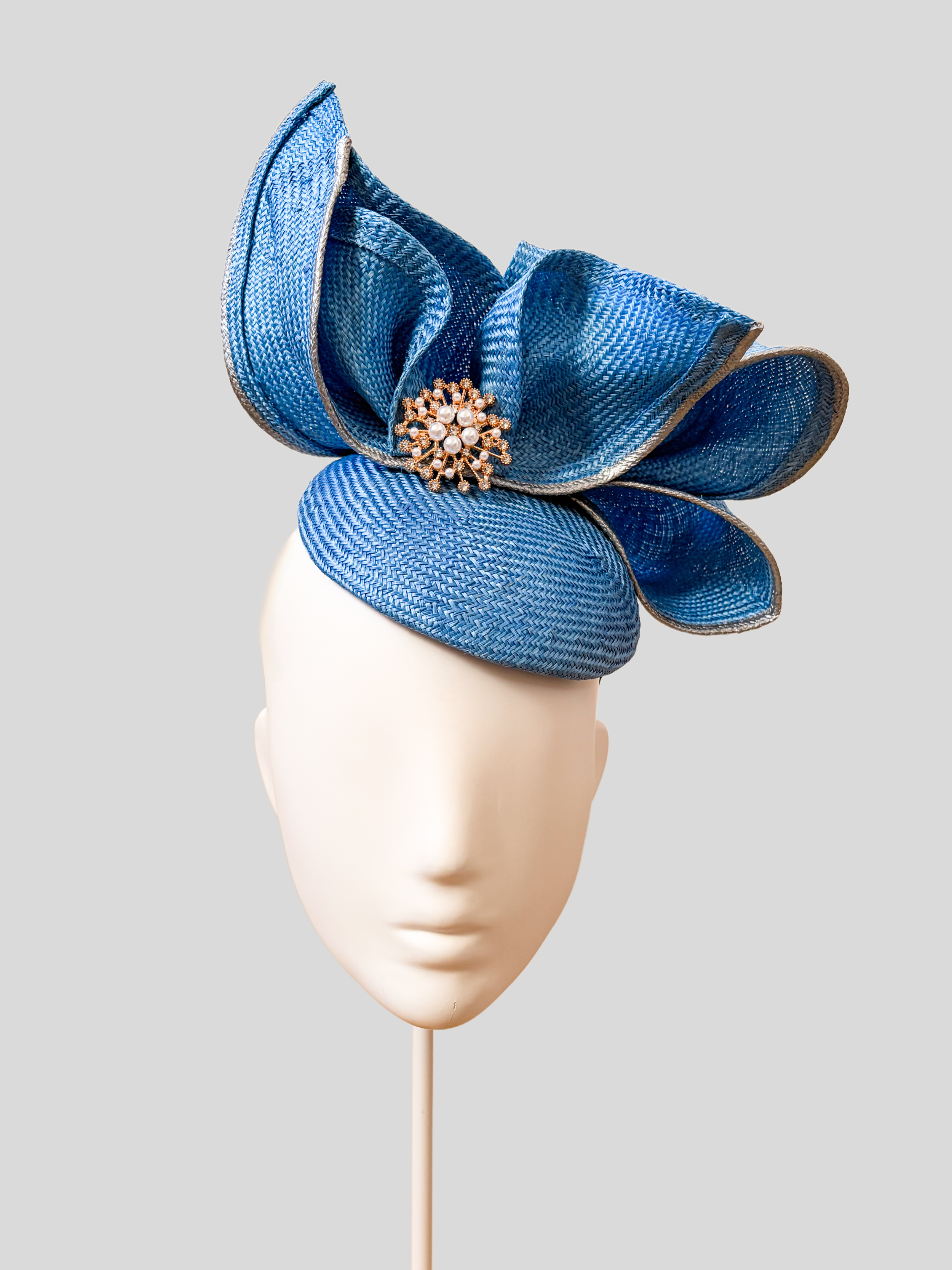 aria-sapphire-sculptural-parisisal-headpiece-front.png