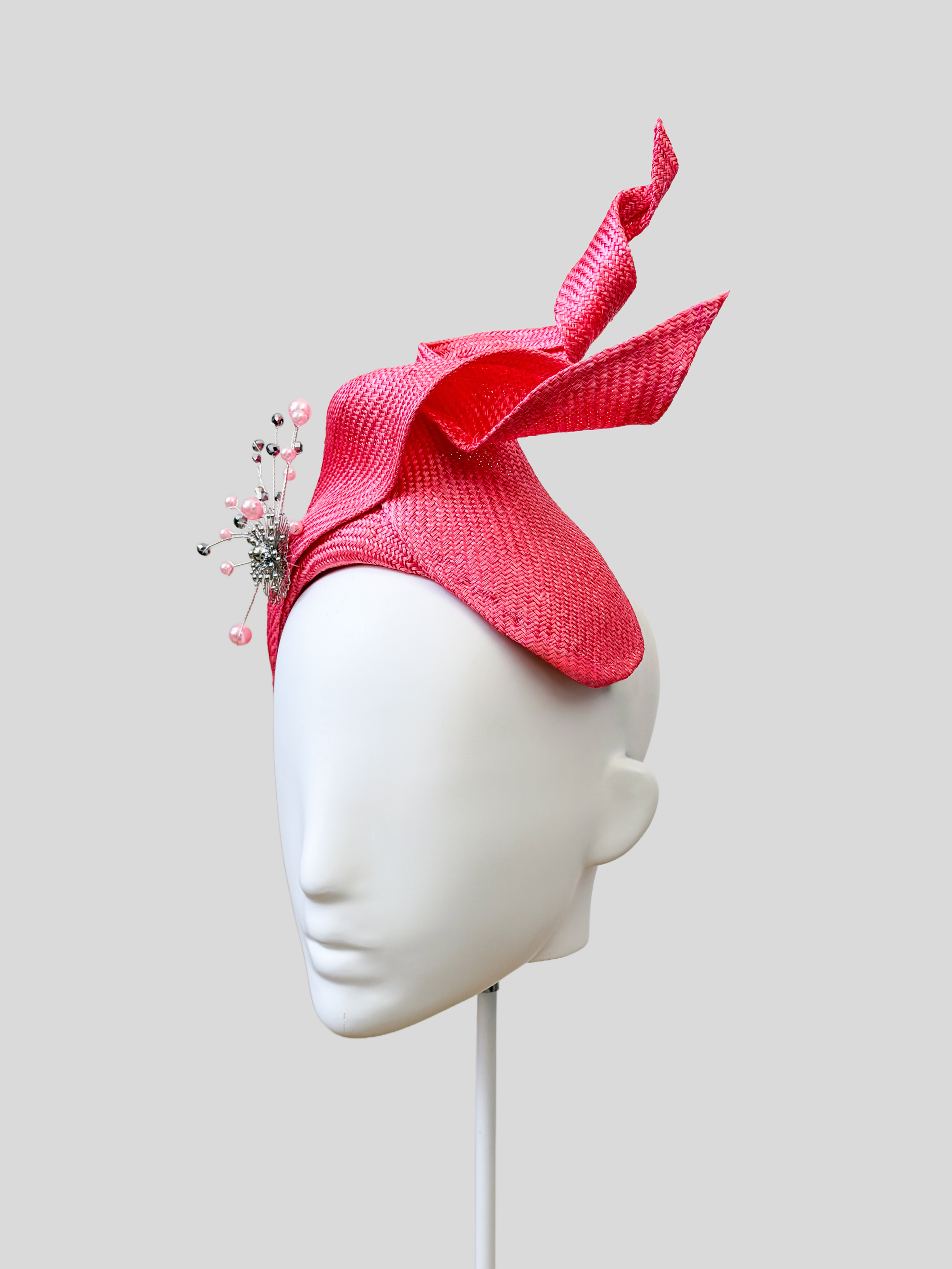 Right: Right-side view of the SÉLÈNE Rose Parisisal bandeau headband highlighting its soft pink finish and silver embellishment.