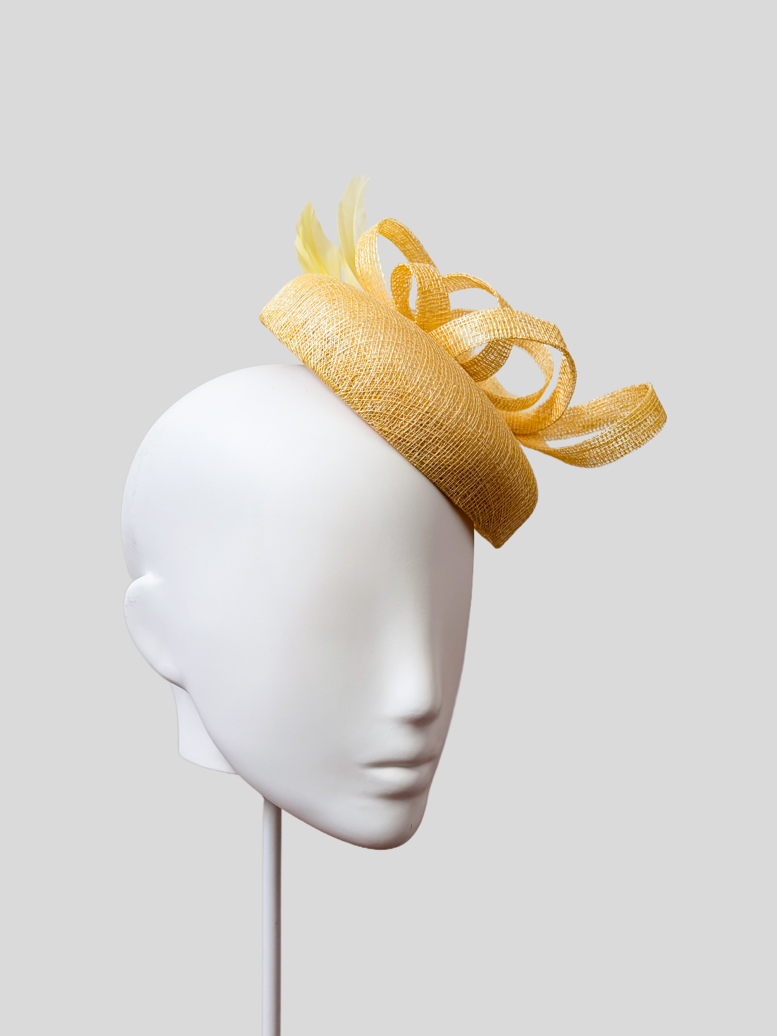 yellow-sinamay-fascinator-loops-feather-racewear-left.jpg.png