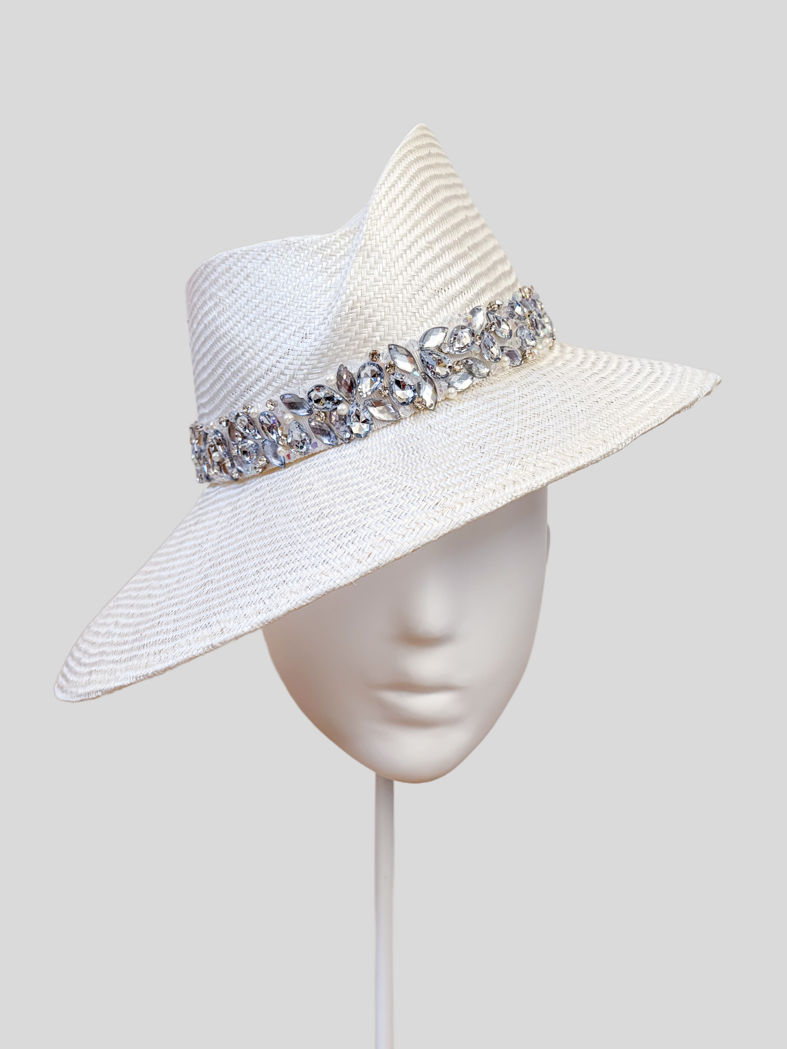 Front: MAISON Pearl Parisisal fedora featuring a sculptural Divine Millinery block and hand-embellished silver and crystal band.