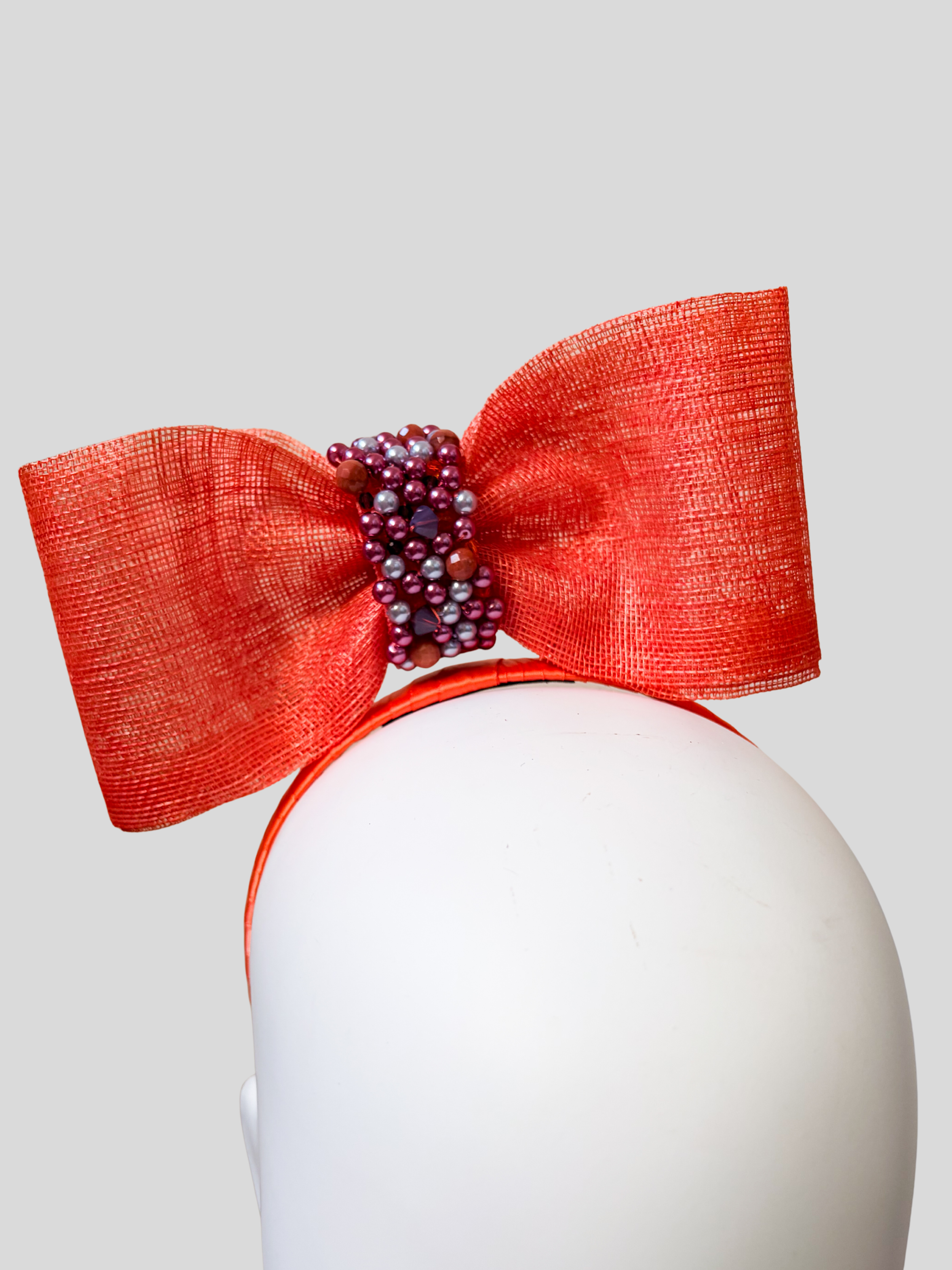 orange-sinamay-headband-bow-swarovski-beads-close-up-view.jpg.png