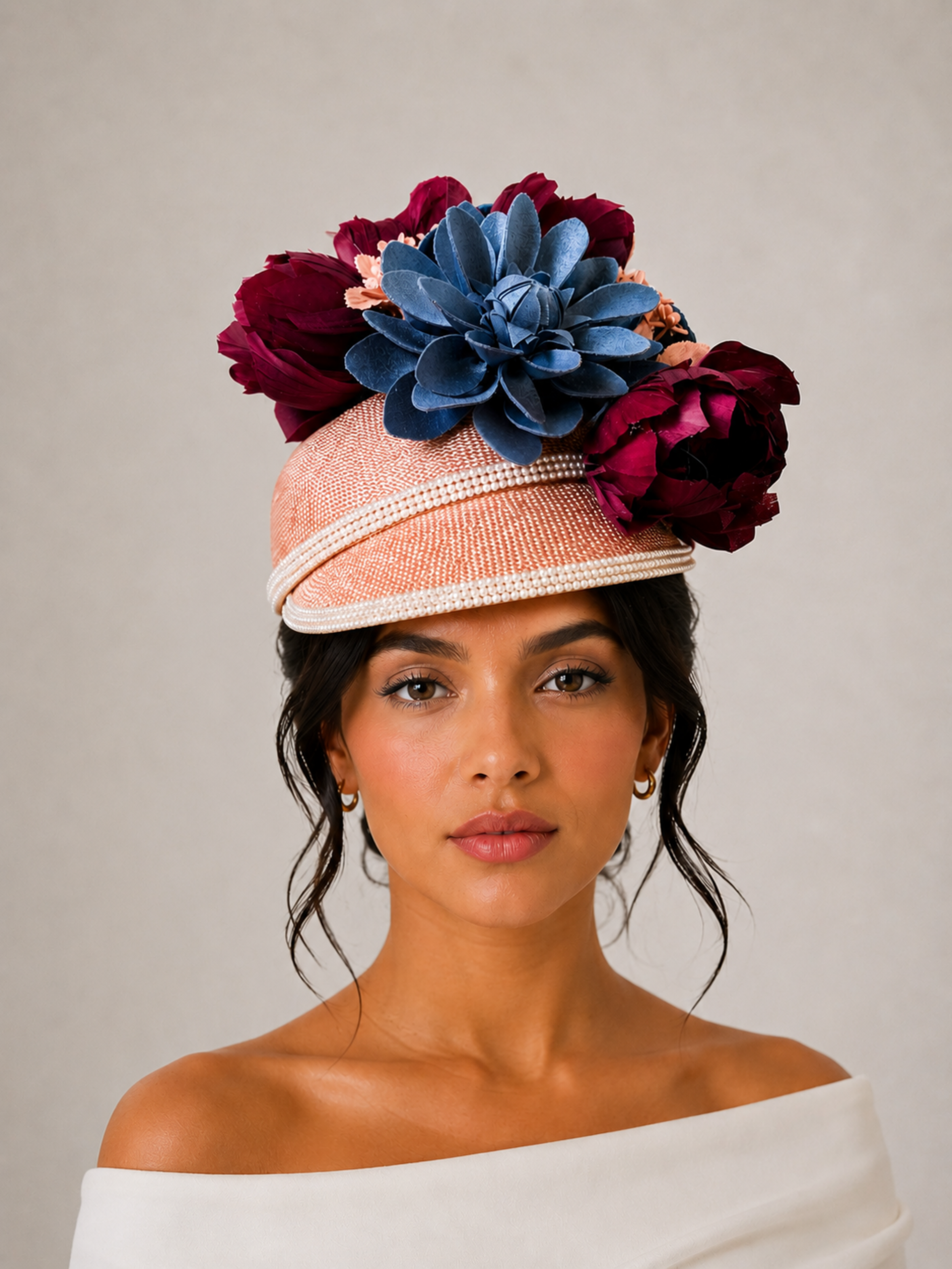 Model: Rosalie Rose floral jockey cap styled on a model.