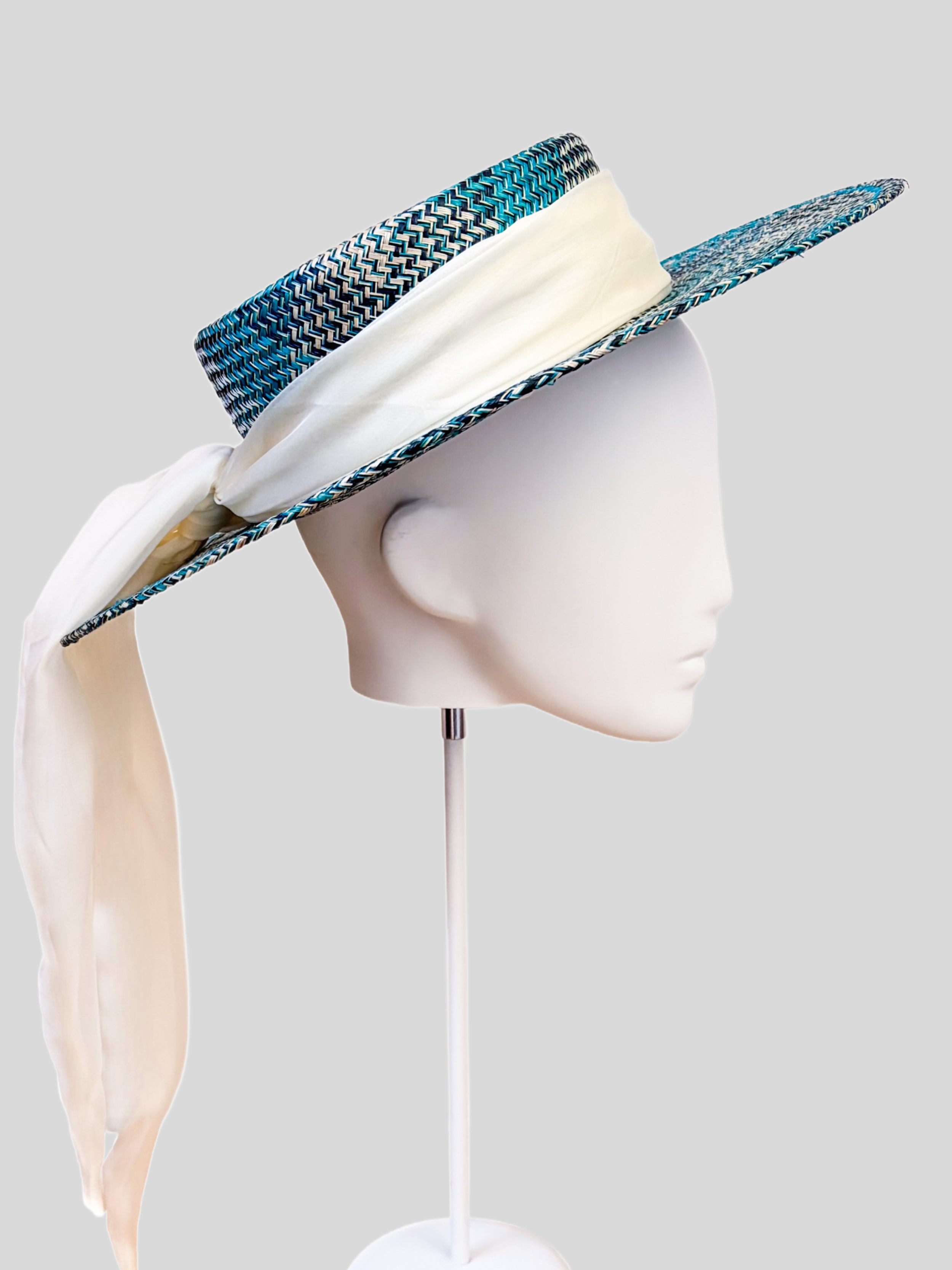 Solara Azure woven boater hat shown from the left side.
